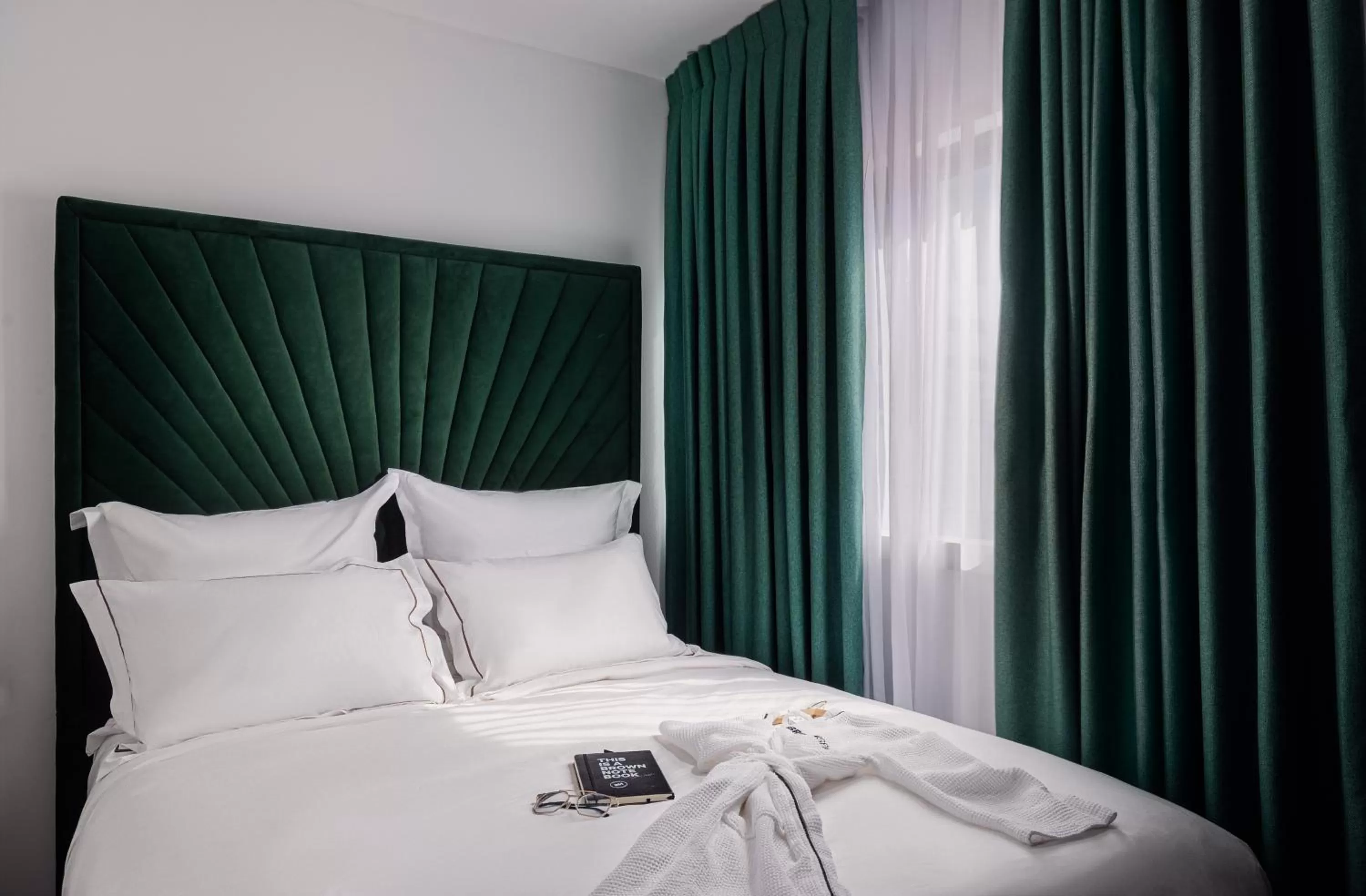 Bed in Townhouse Residence a member of Brown Hotels