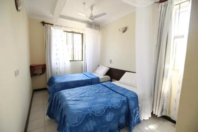 Bed in Coastgate Hotel