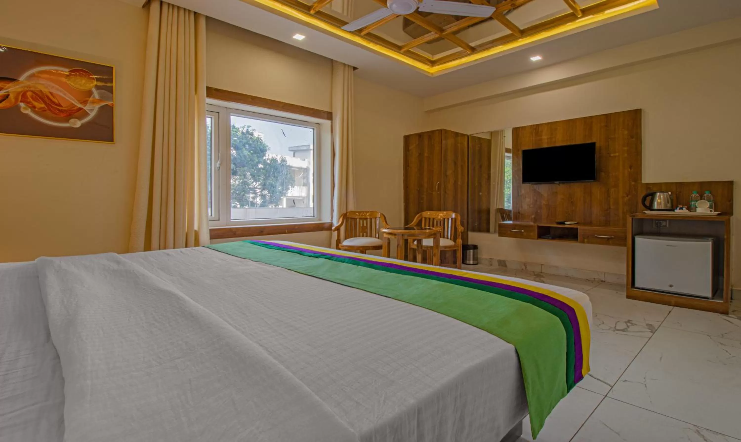 Bed in Treebo Trend Haveli Resort Roots Bhupatwala