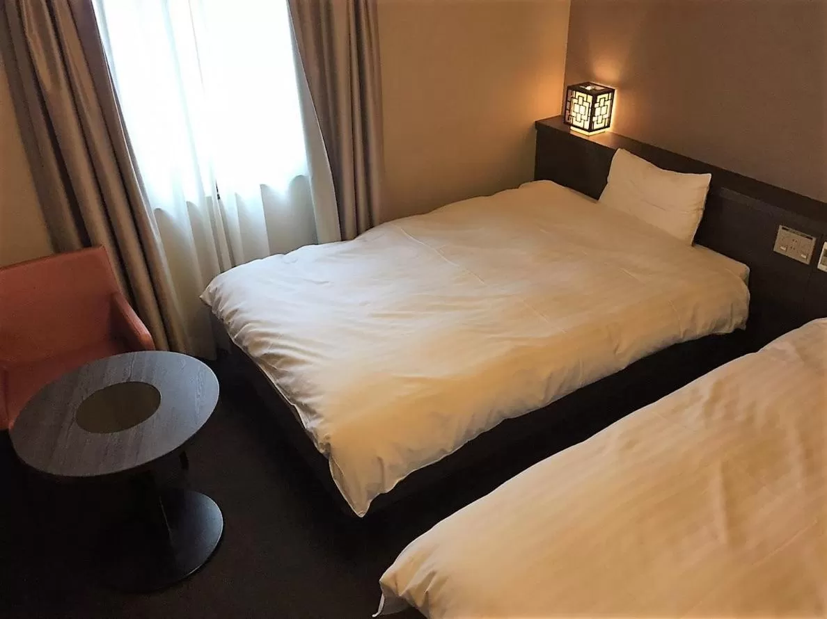 Photo of the whole room, Bed in Dormy Inn Nagasaki Shinchichukagai