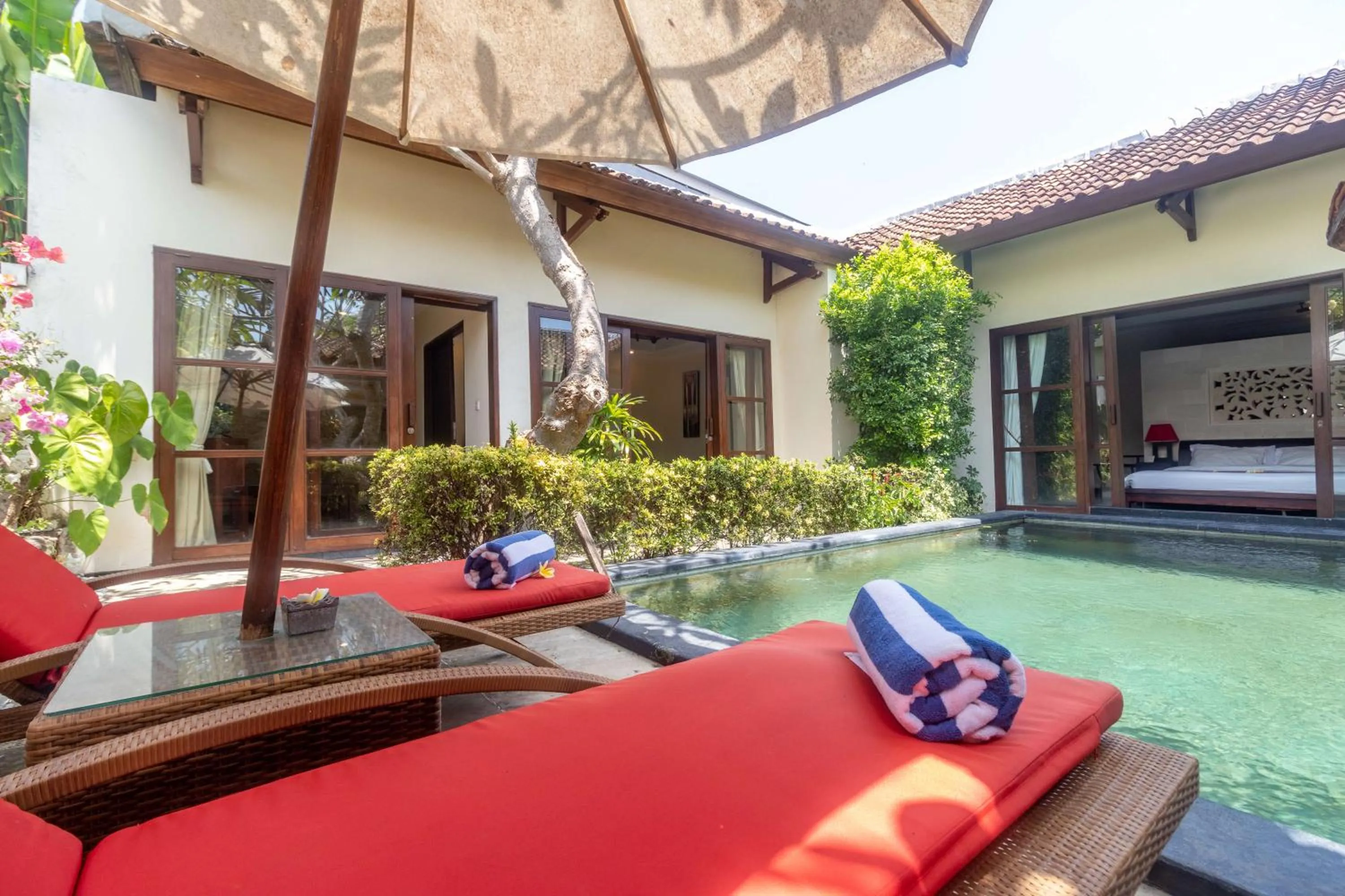Swimming pool in Aleesha Villas and Suites