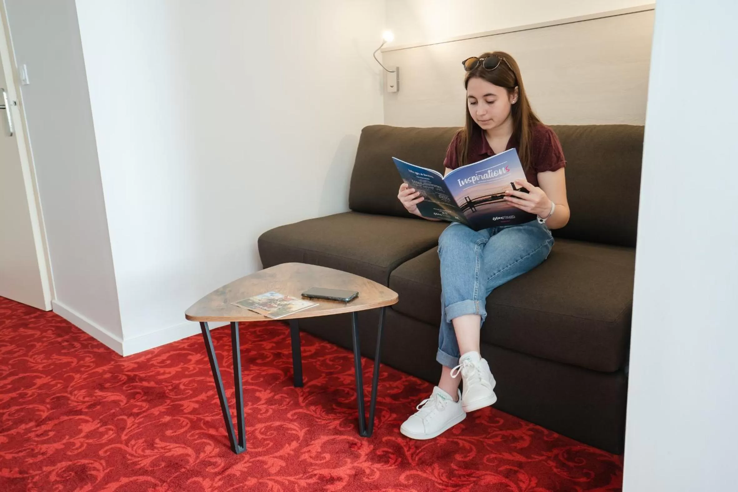 Seating area in Brit Hotel Essentiel Cholet