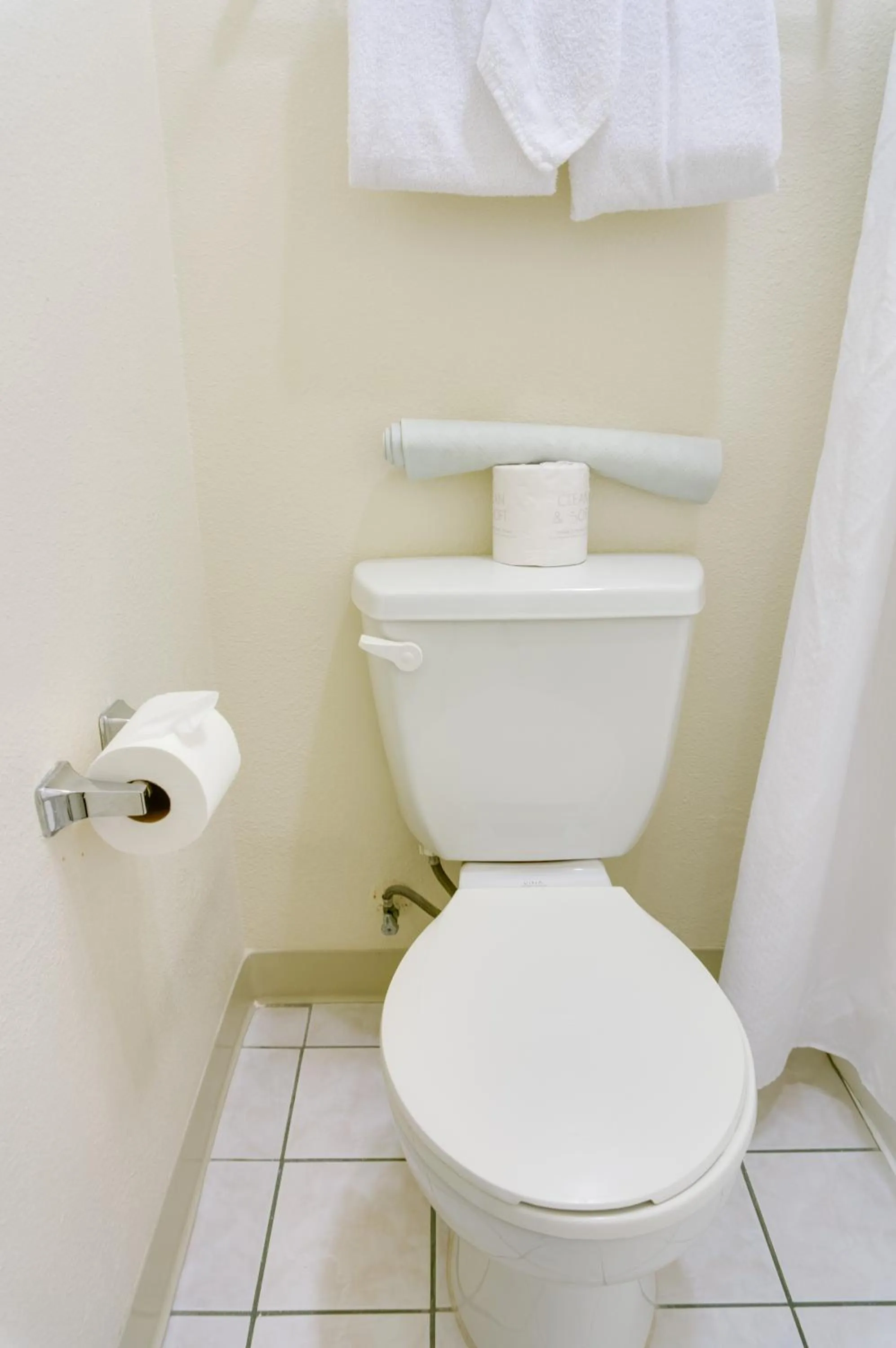 Toilet in California Suites Hotel