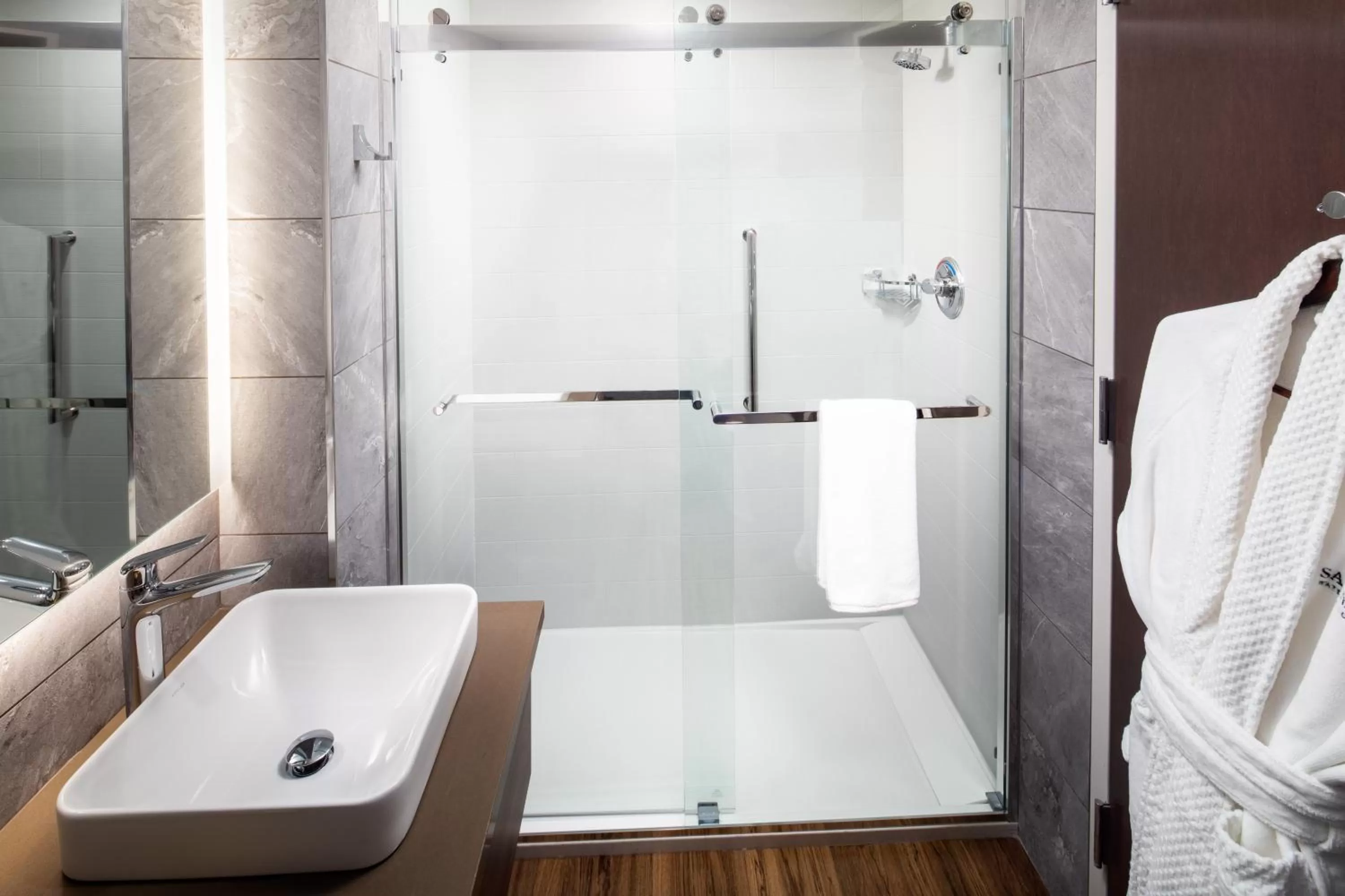 Bathroom in voco Saranac Lake NY - Waterfront by IHG