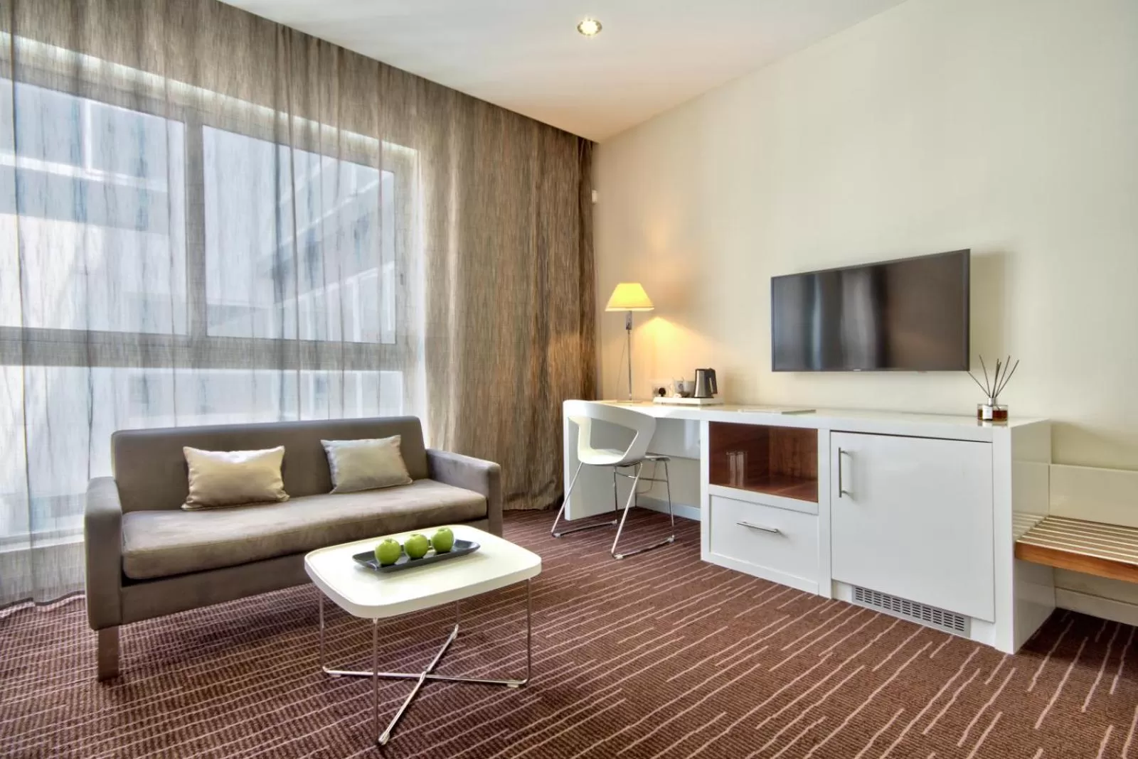 Communal lounge/ TV room in The George, Urban Boutique Hotel