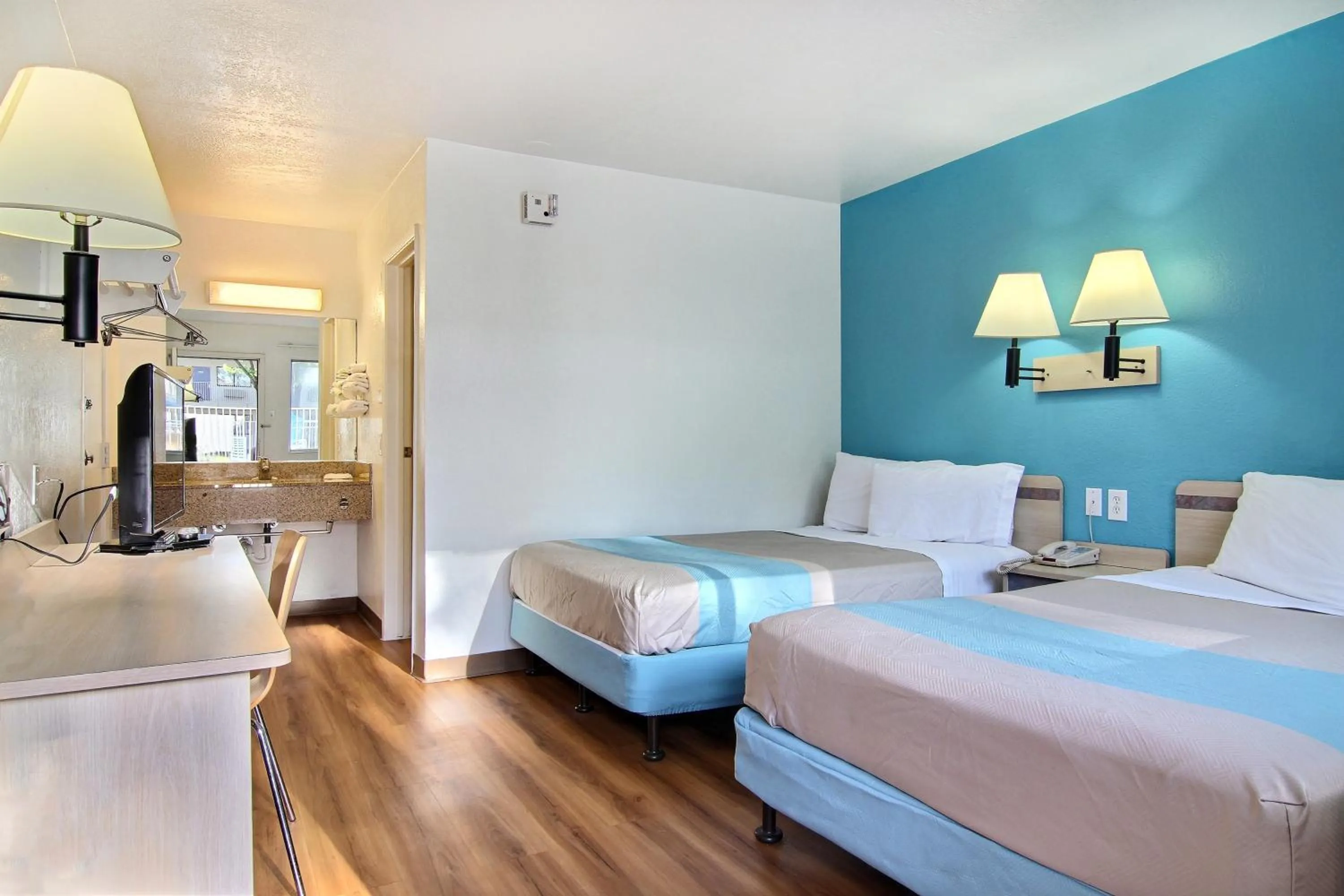 Bathroom, Bed in Motel 6-Lubbock, TX