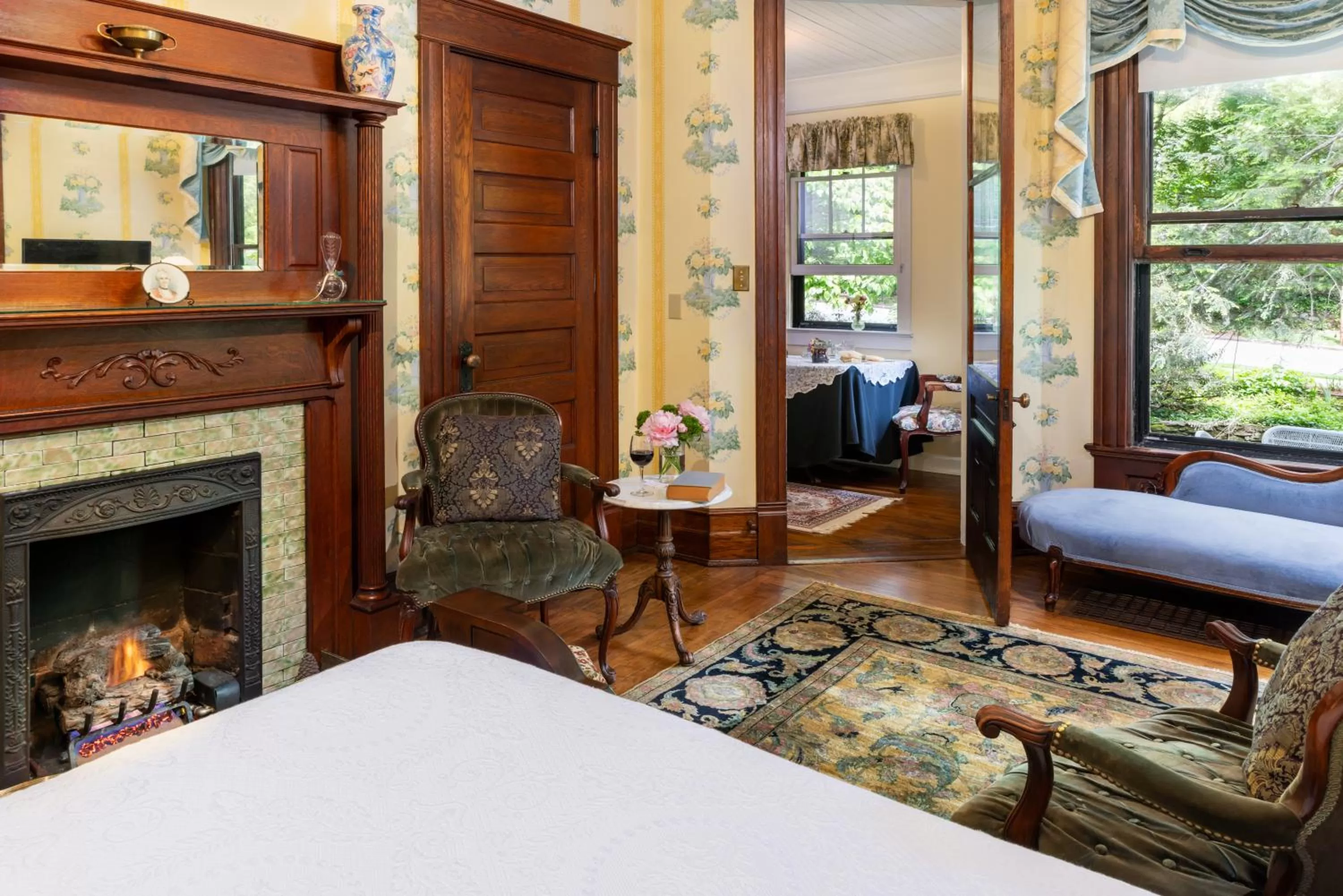 Bedroom, Seating Area in The 1899 Wright Inn & Carriage House