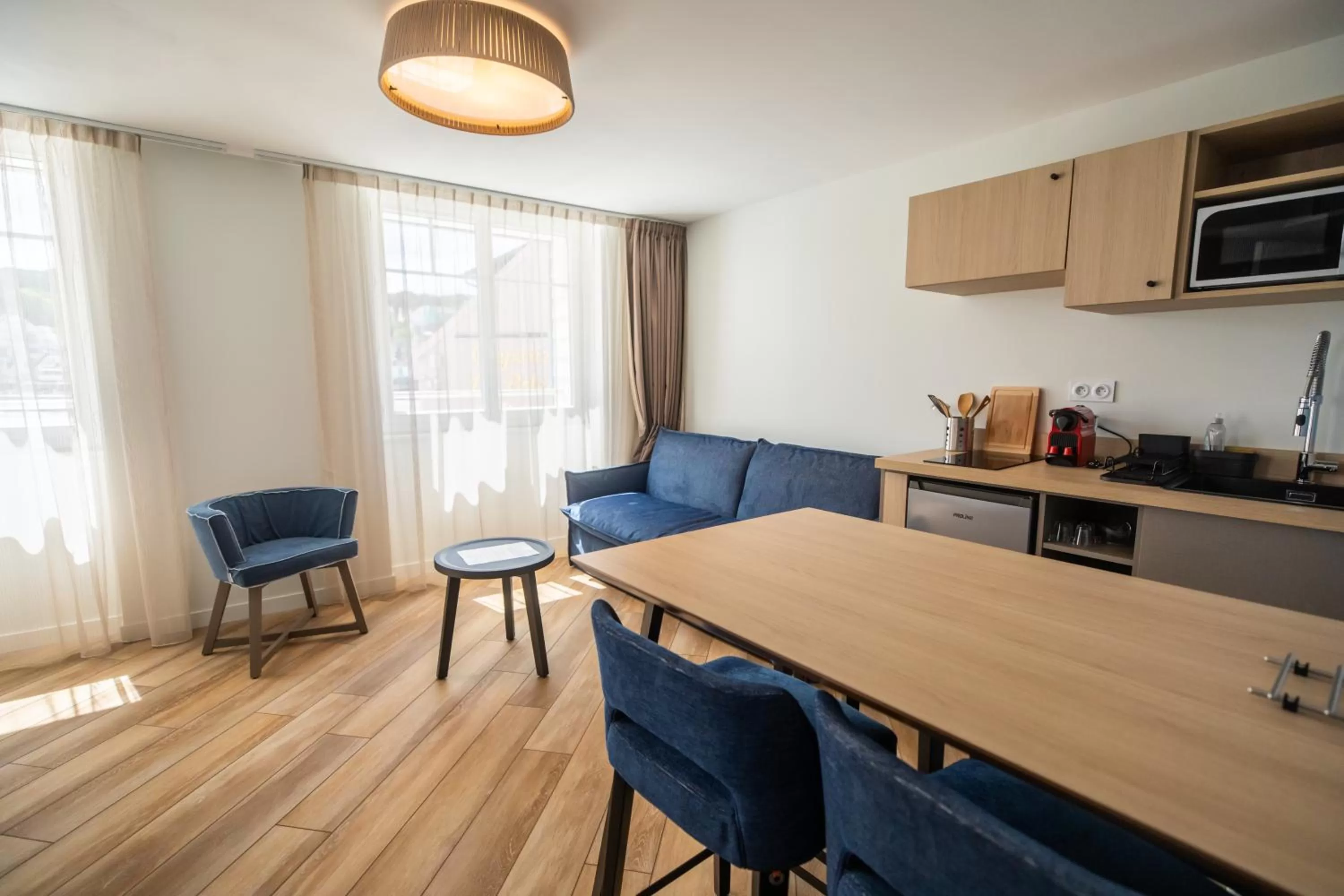 Kitchen or kitchenette in Hôtel de la Baie