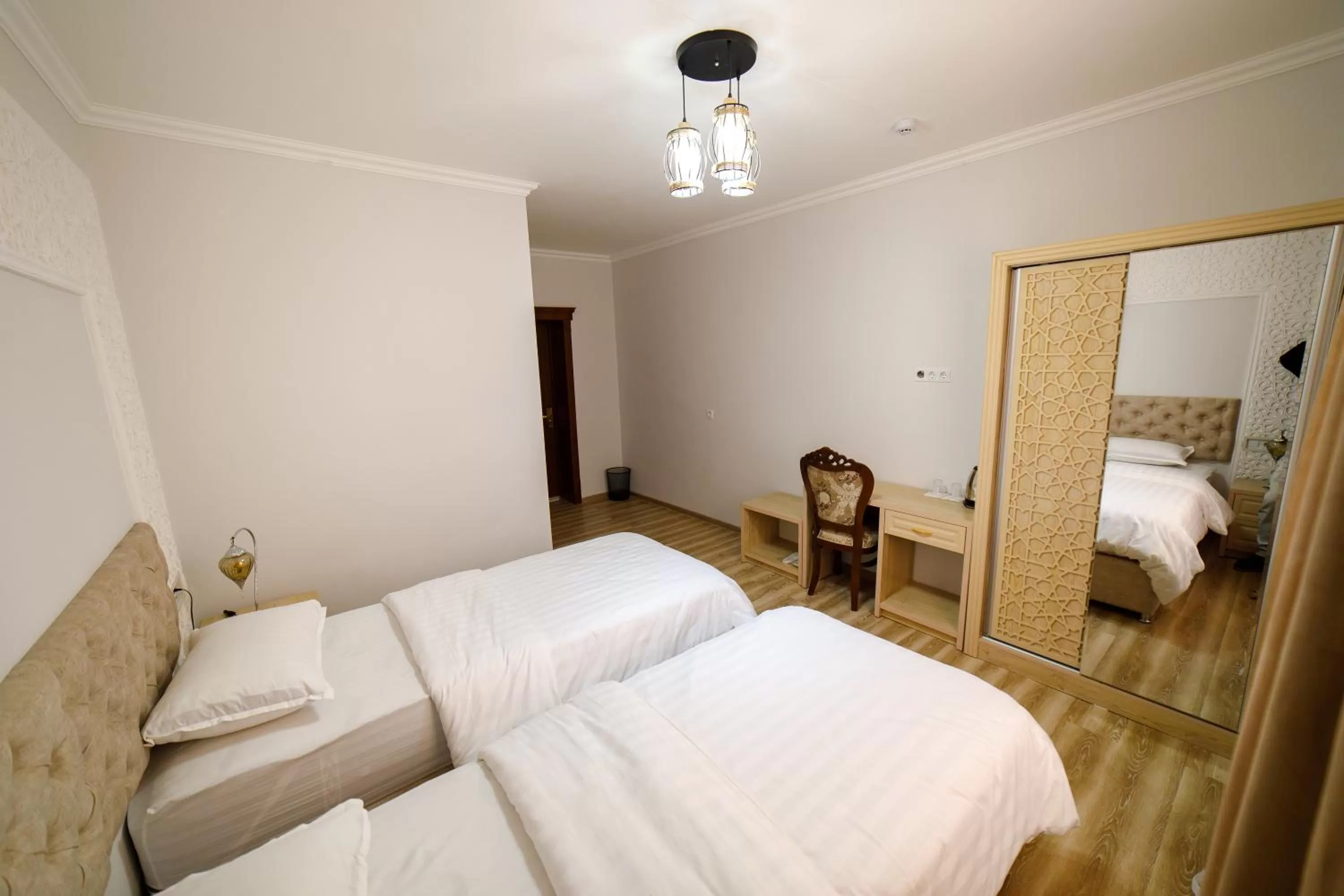 Bed in Khans Palace Hotel