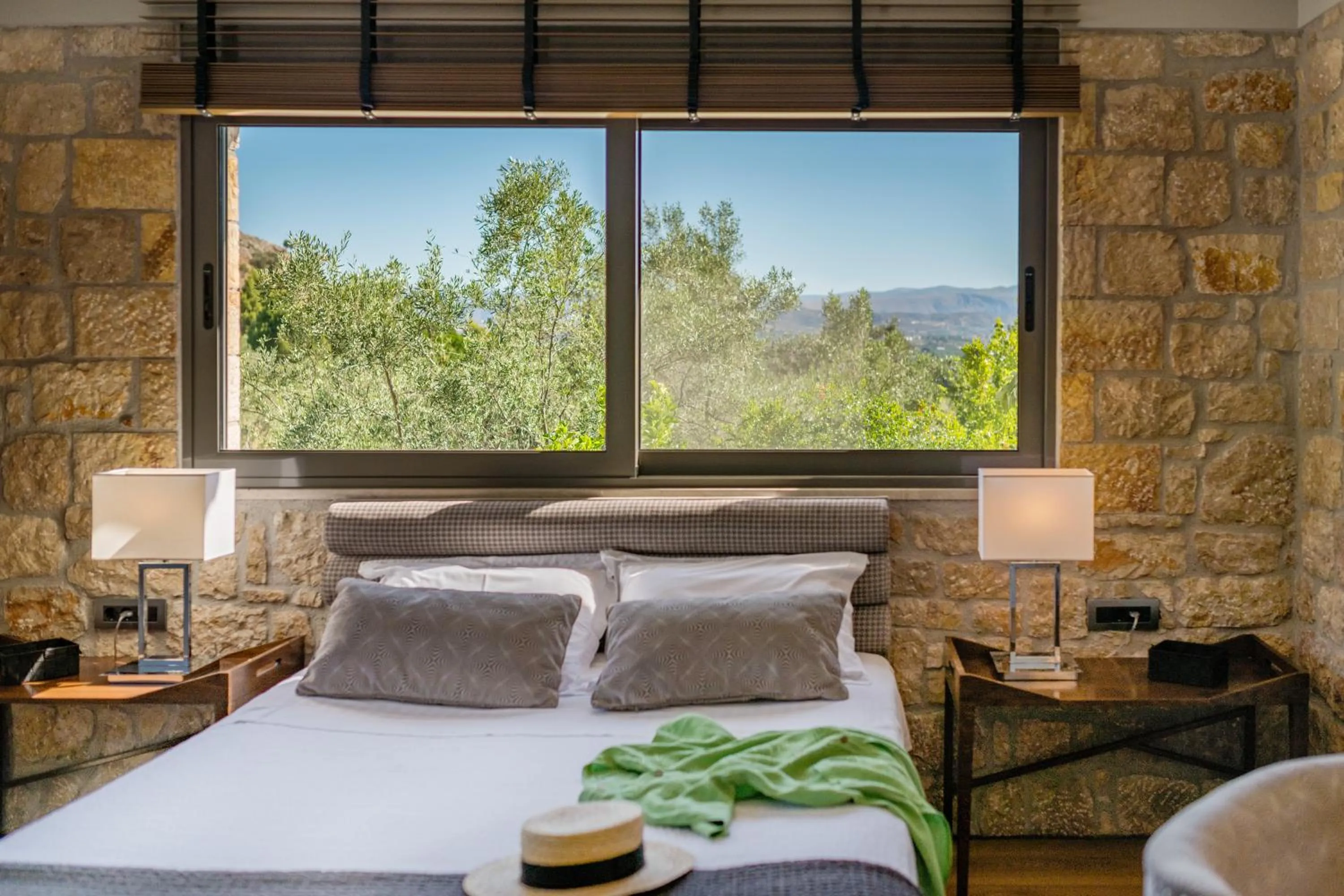 Bed in Anthemion Suites and Villas