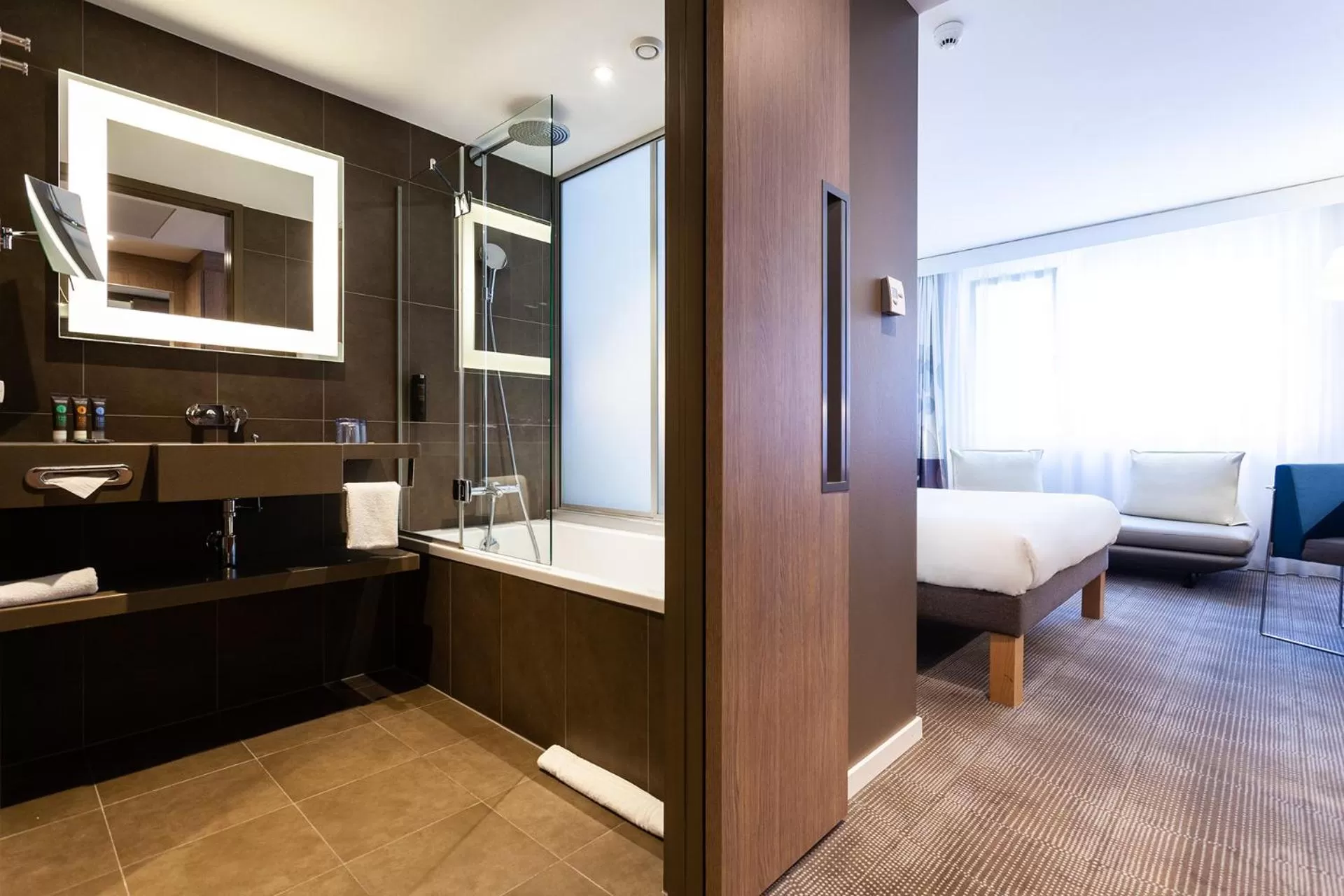 Bathroom, Bed in Novotel Basel City