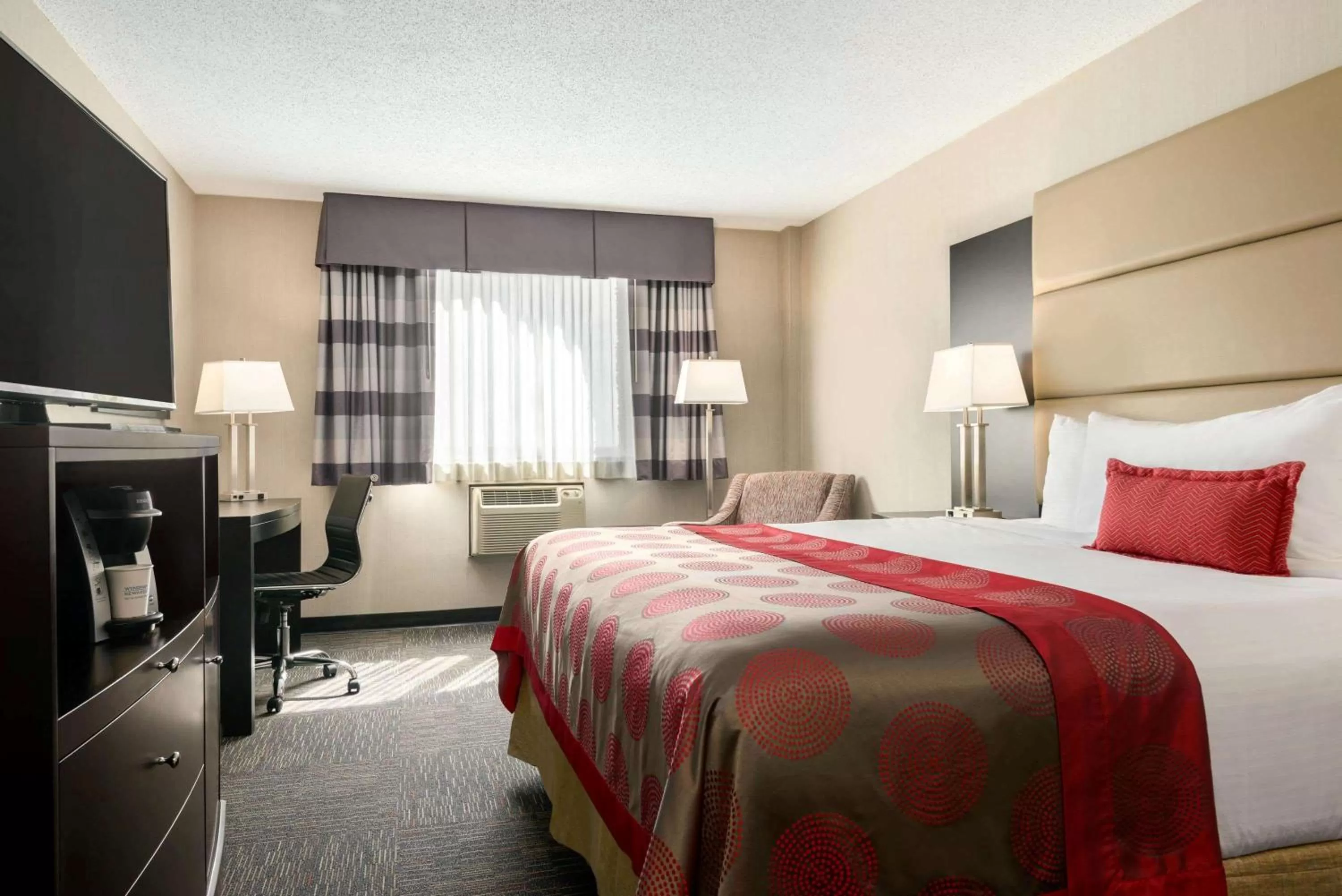 Superior King Suite with City View - Non Smoking in Ramada by Wyndham Saskatoon