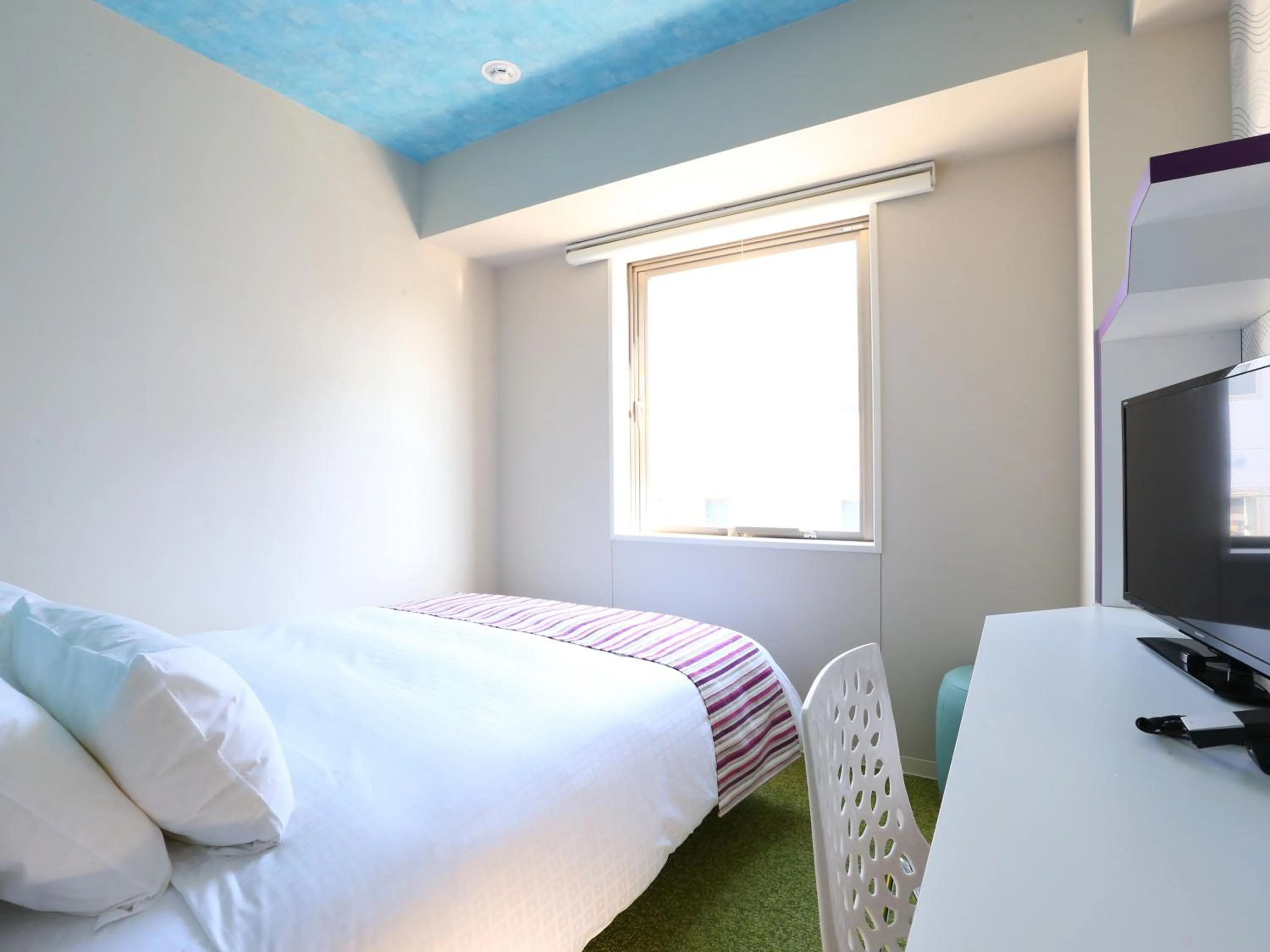 Bed in KOKO HOTEL Higashiosaka - formerly Hotel Wing International Select Higashi Osaka