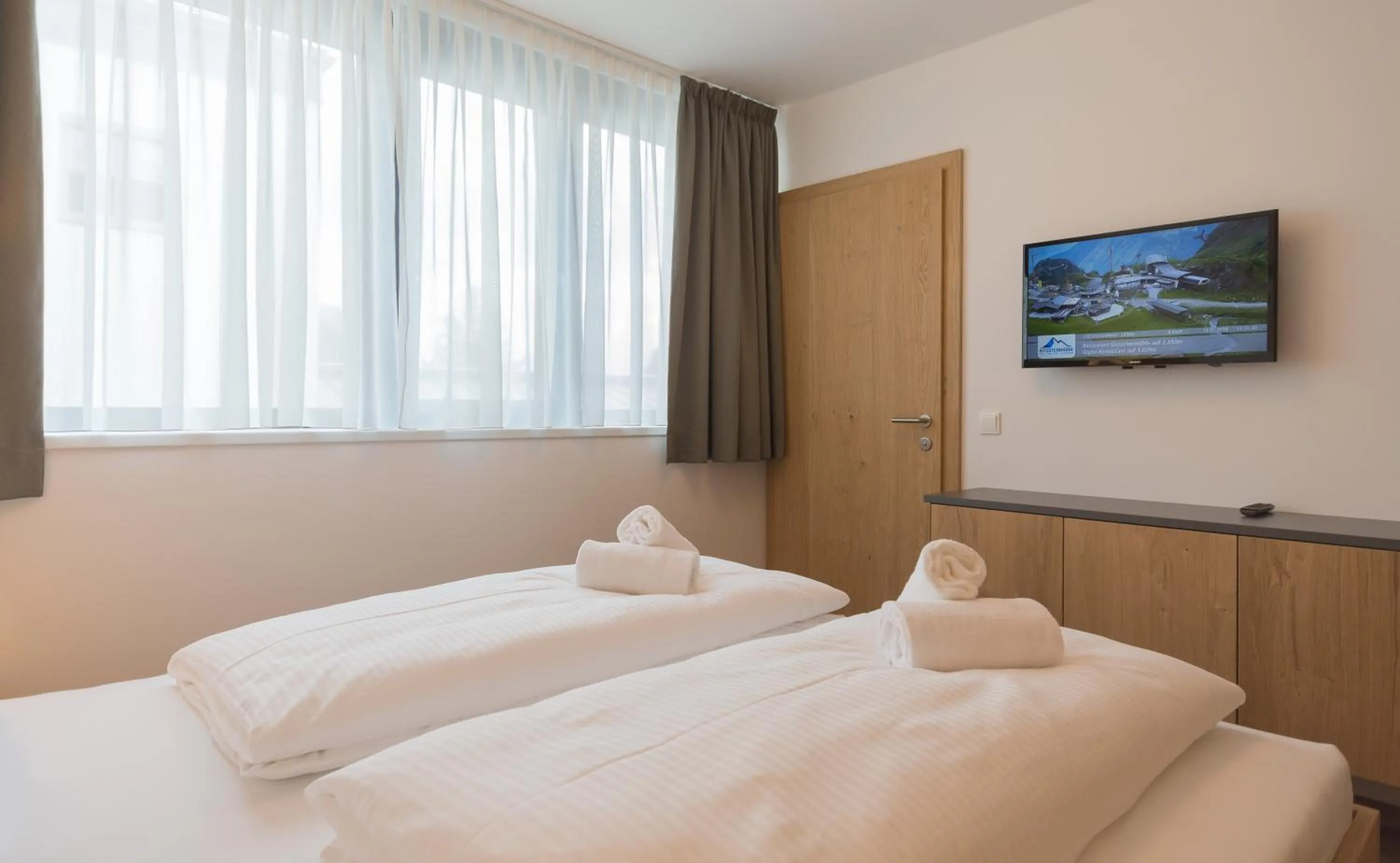 Bedroom, Bed in Schönblick Residence - Absolut Alpine Apartments