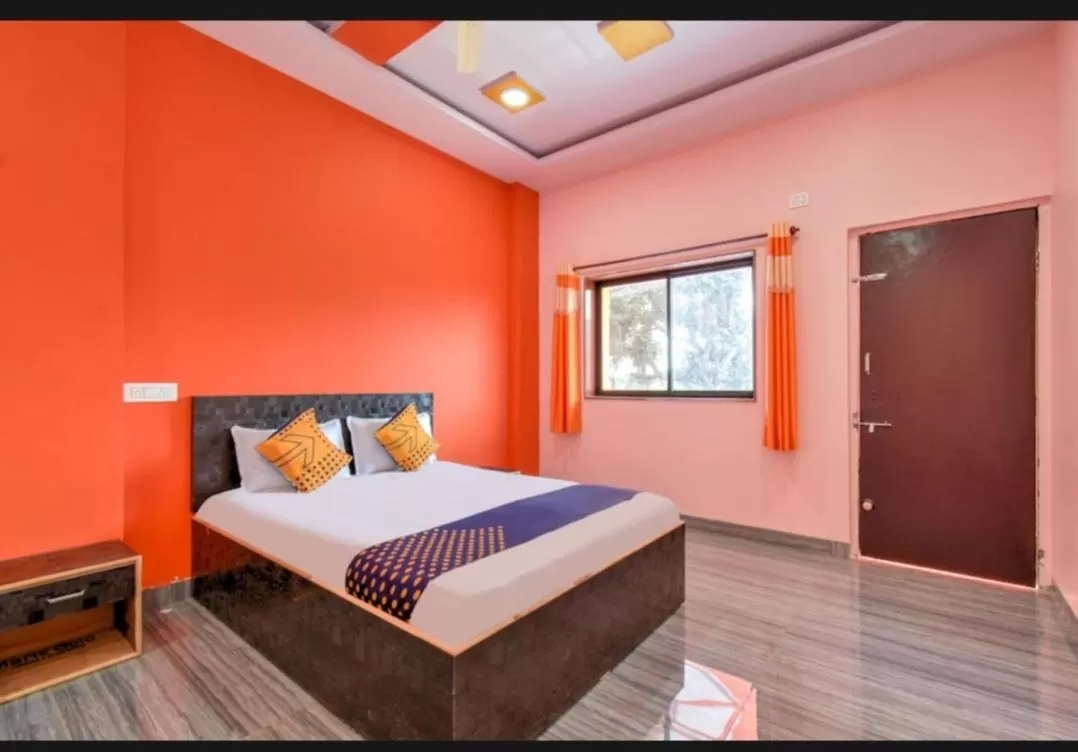 Bed in Hotel Nisarg Lodging And Restaurant