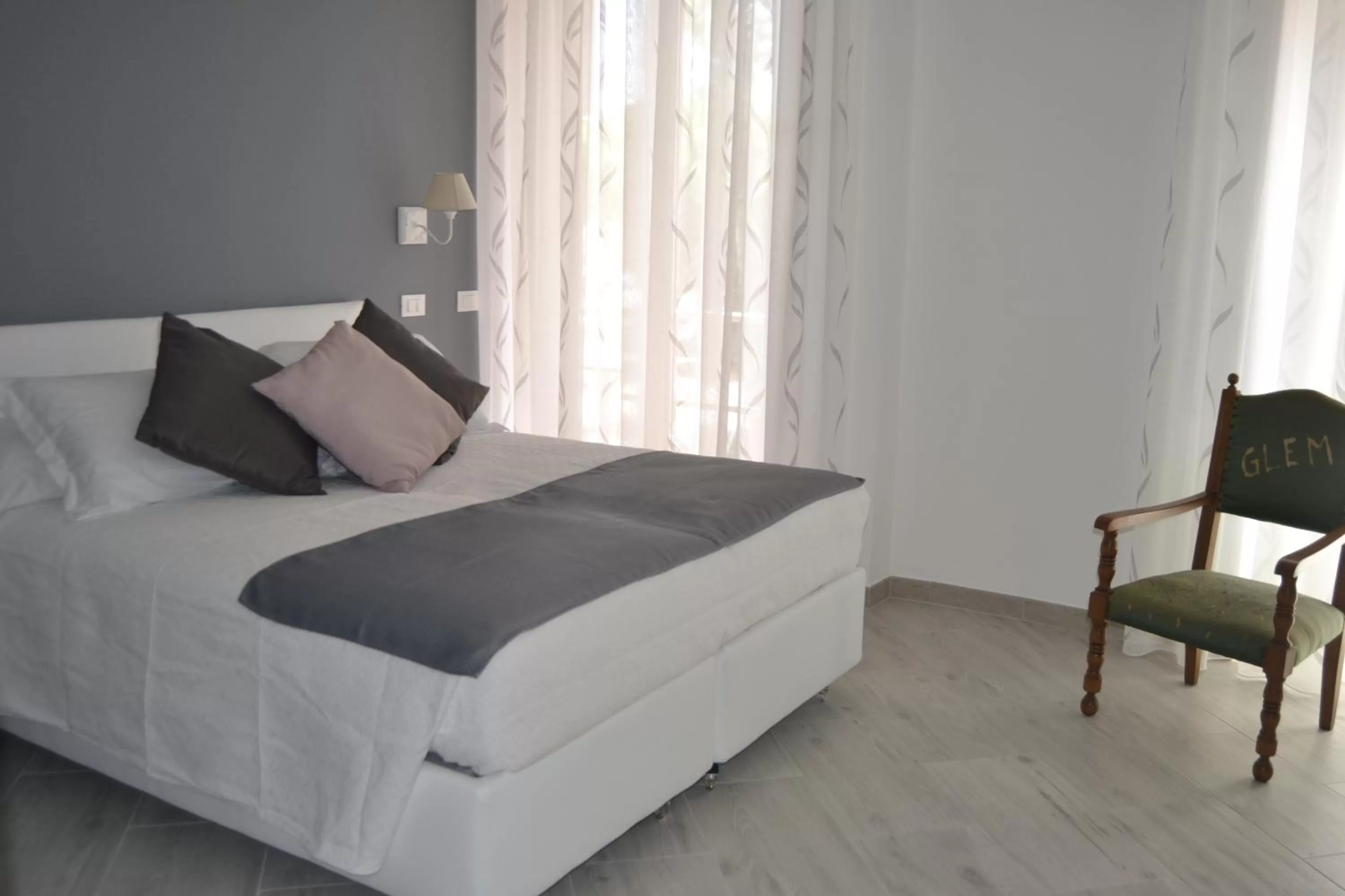 Bed in GLEM rooms & breakfast