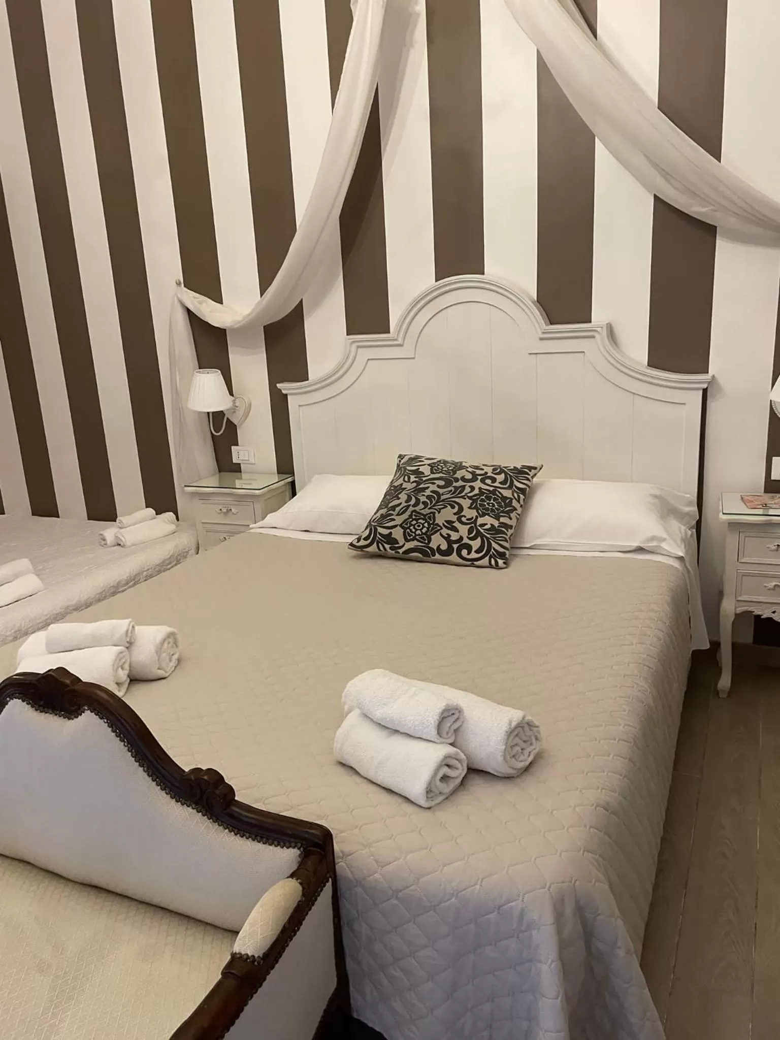 Bed in Vatican Boutique inn