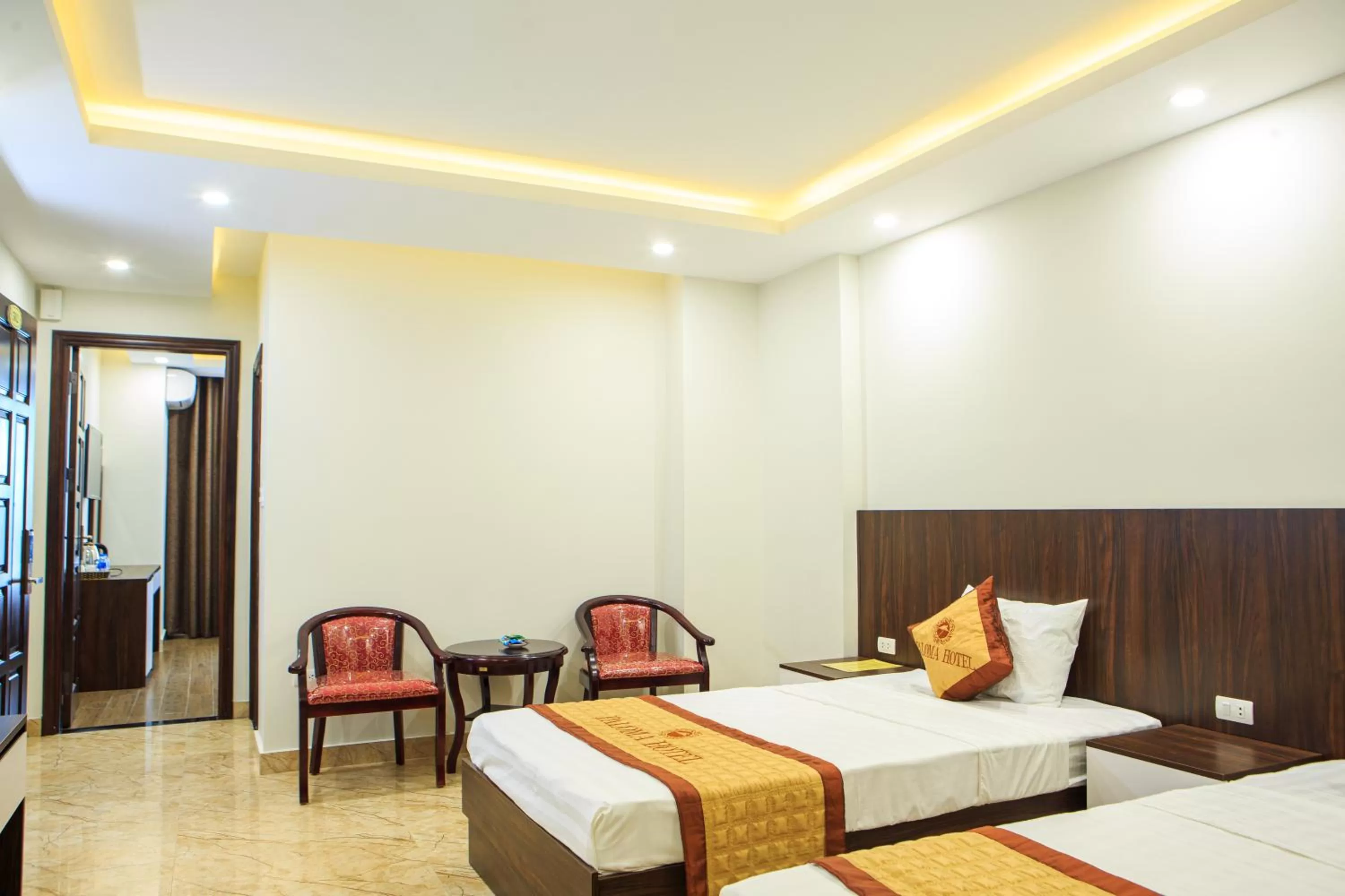 Bed in Paloma Hotel & Apartment