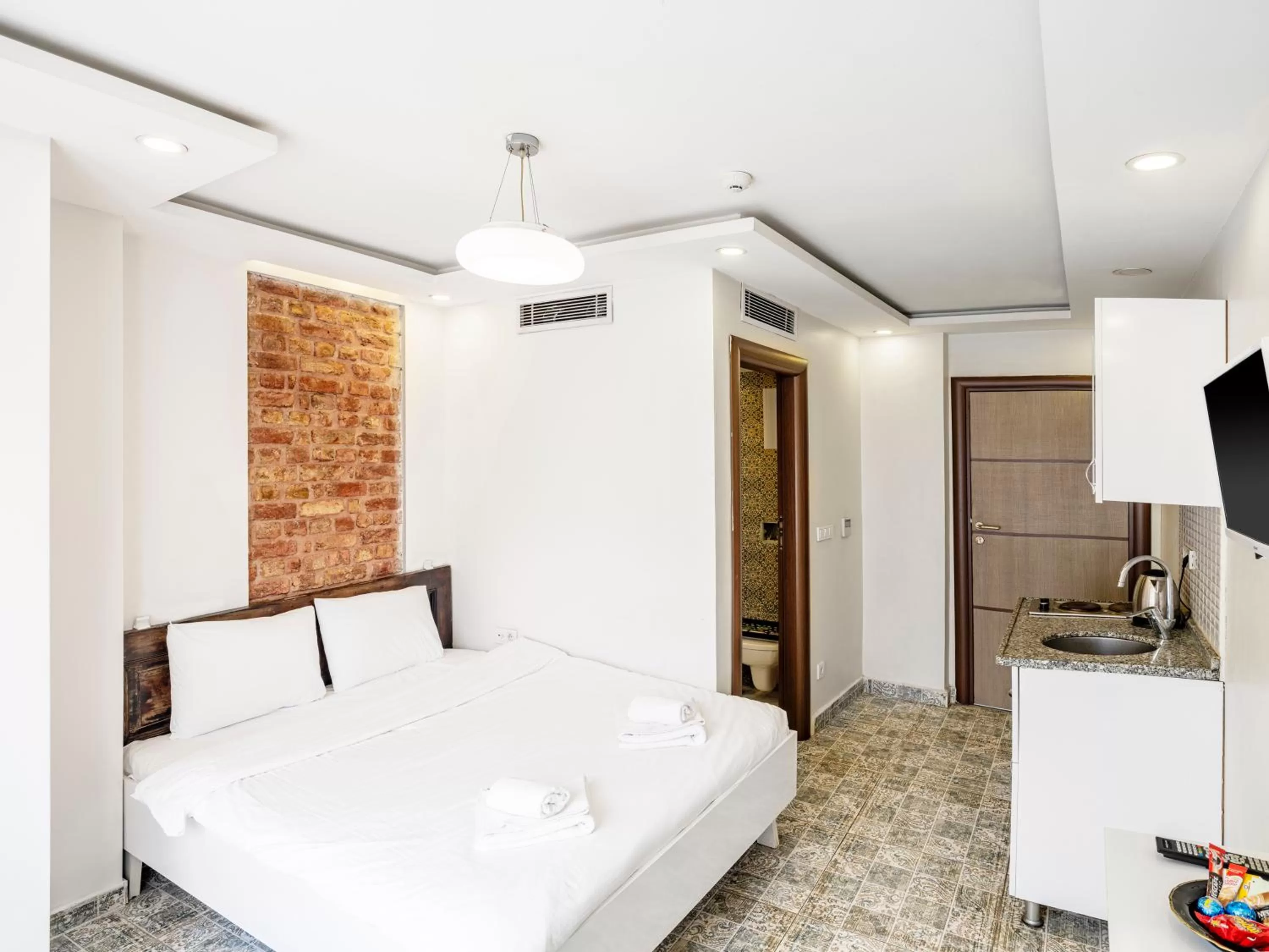 Bed in The Red Tent Suite 88