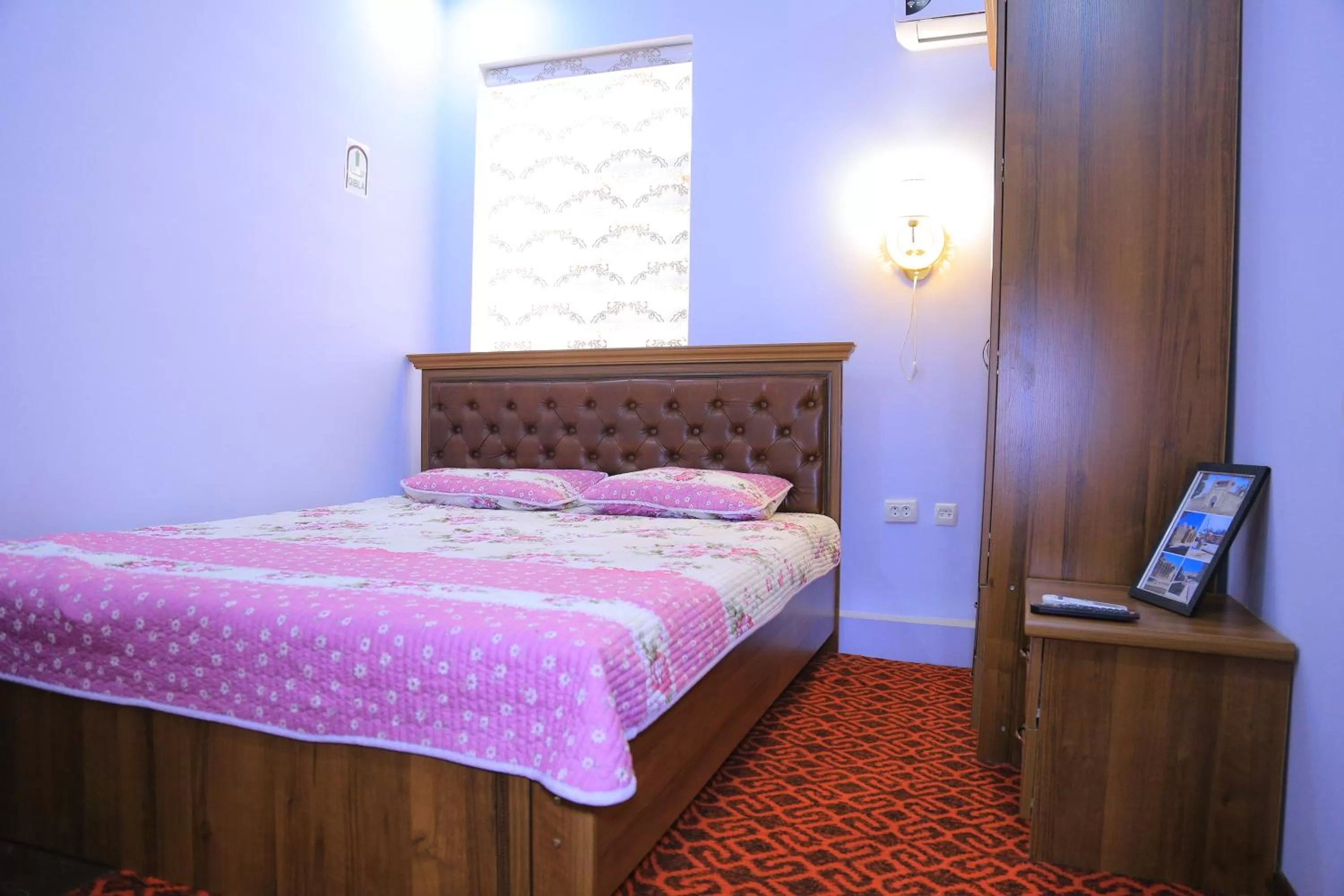 Bedroom in Alliance hotel bukhara