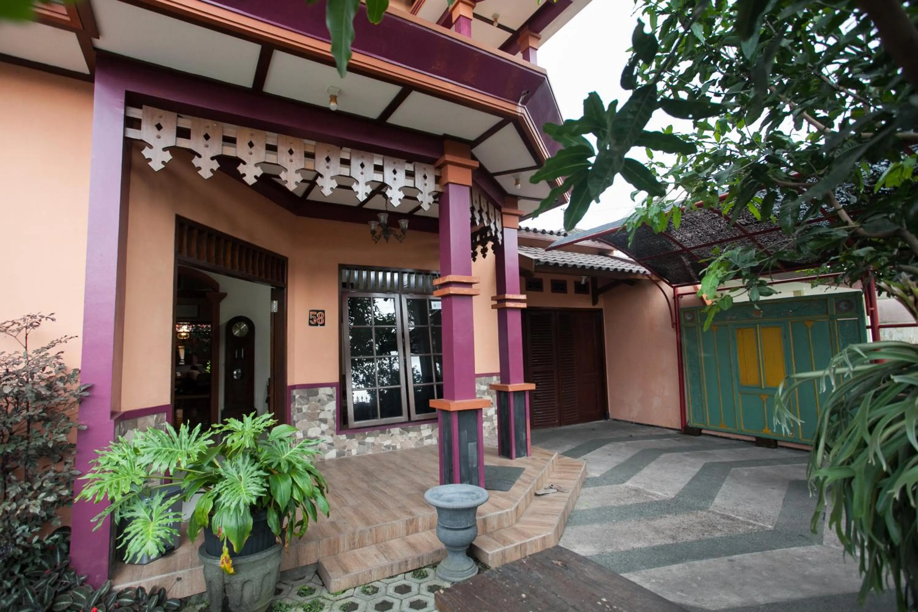 Facade/entrance in RedDoorz @ Omah Wetan Sawojajar Malang