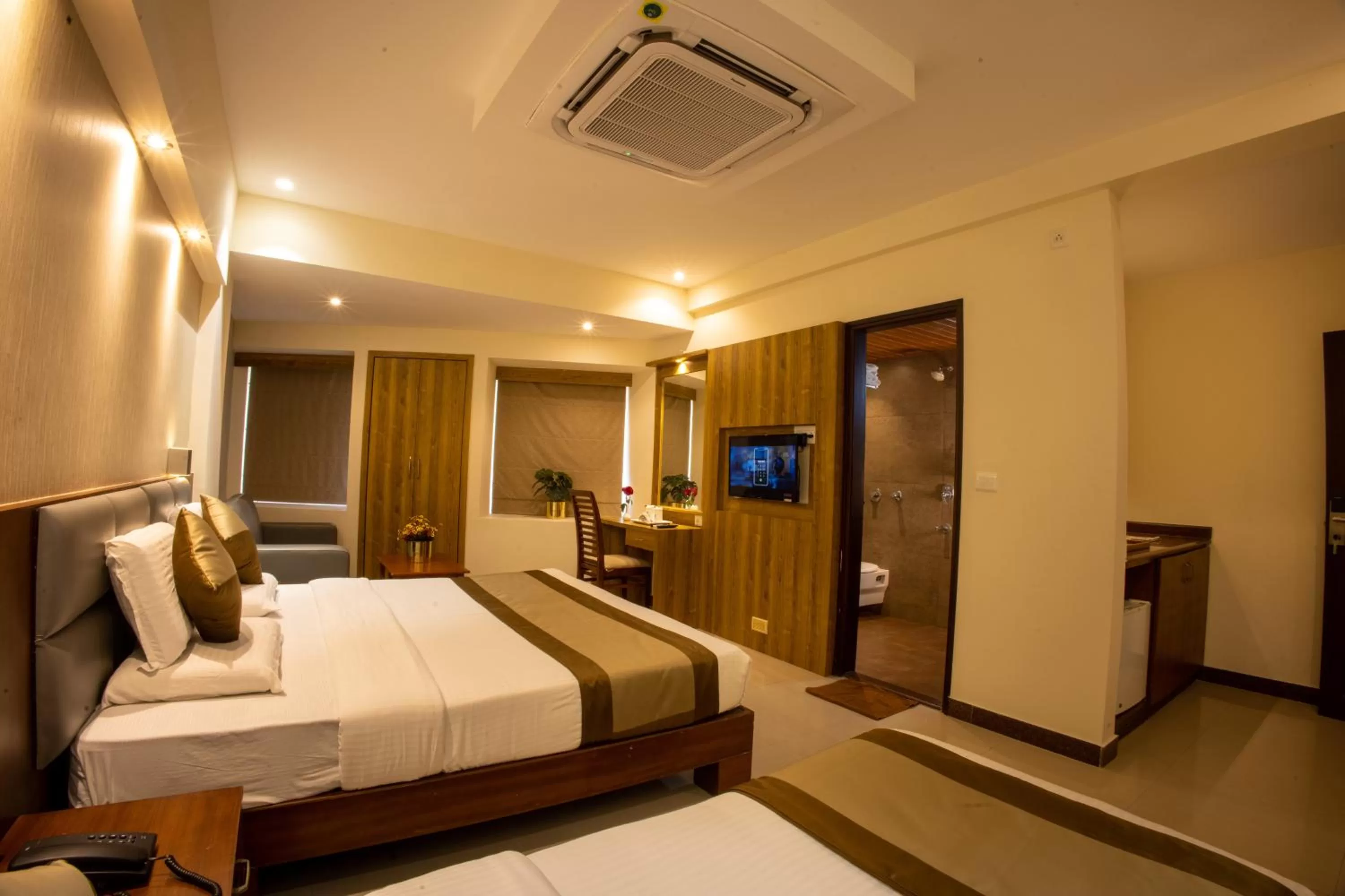 Photo of the whole room, Bed in Metro Plaza Hotel by RAK Rooms, Mangaluru