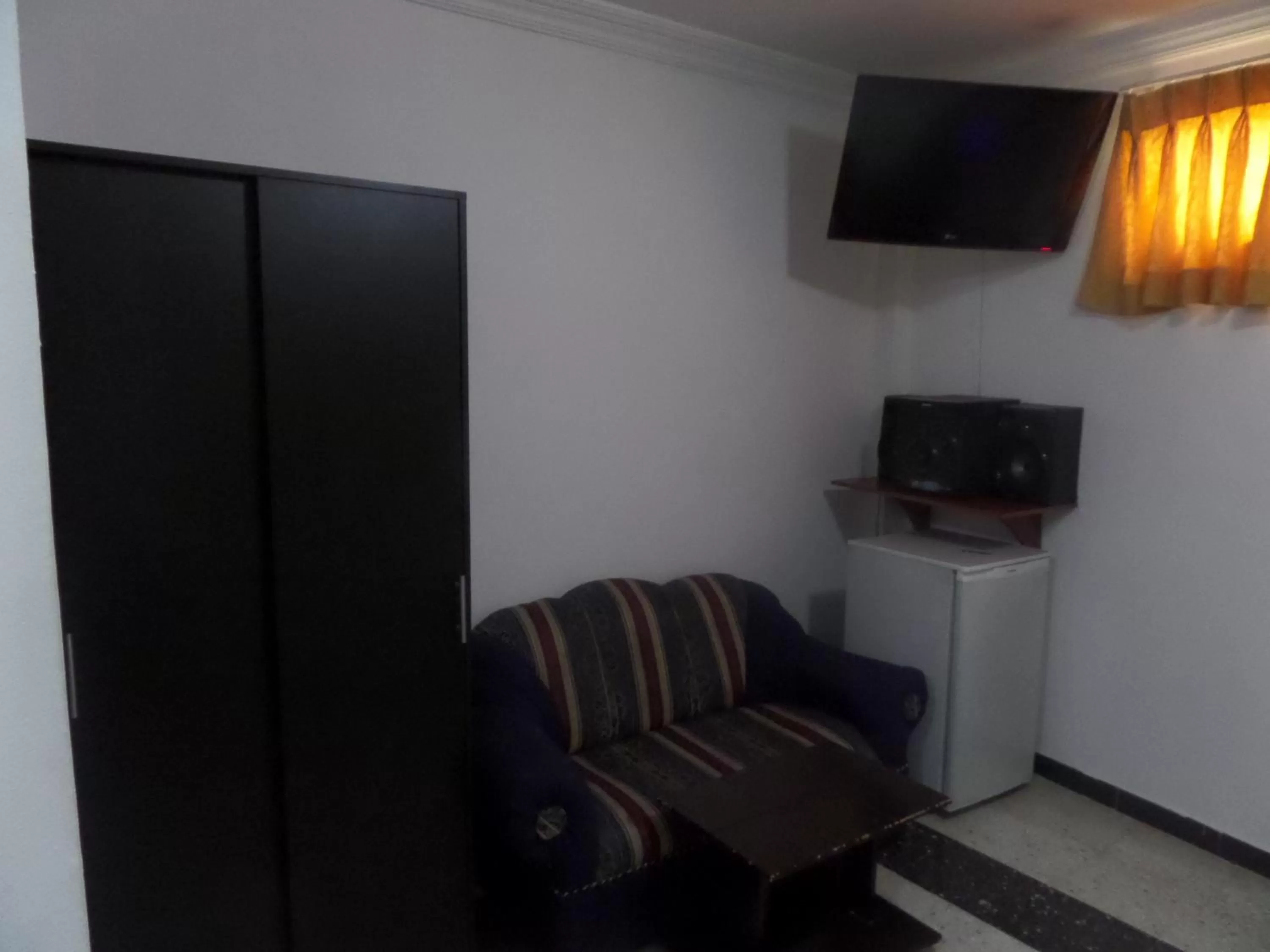 TV and multimedia in Aparta Hotel Plaza Real Norte