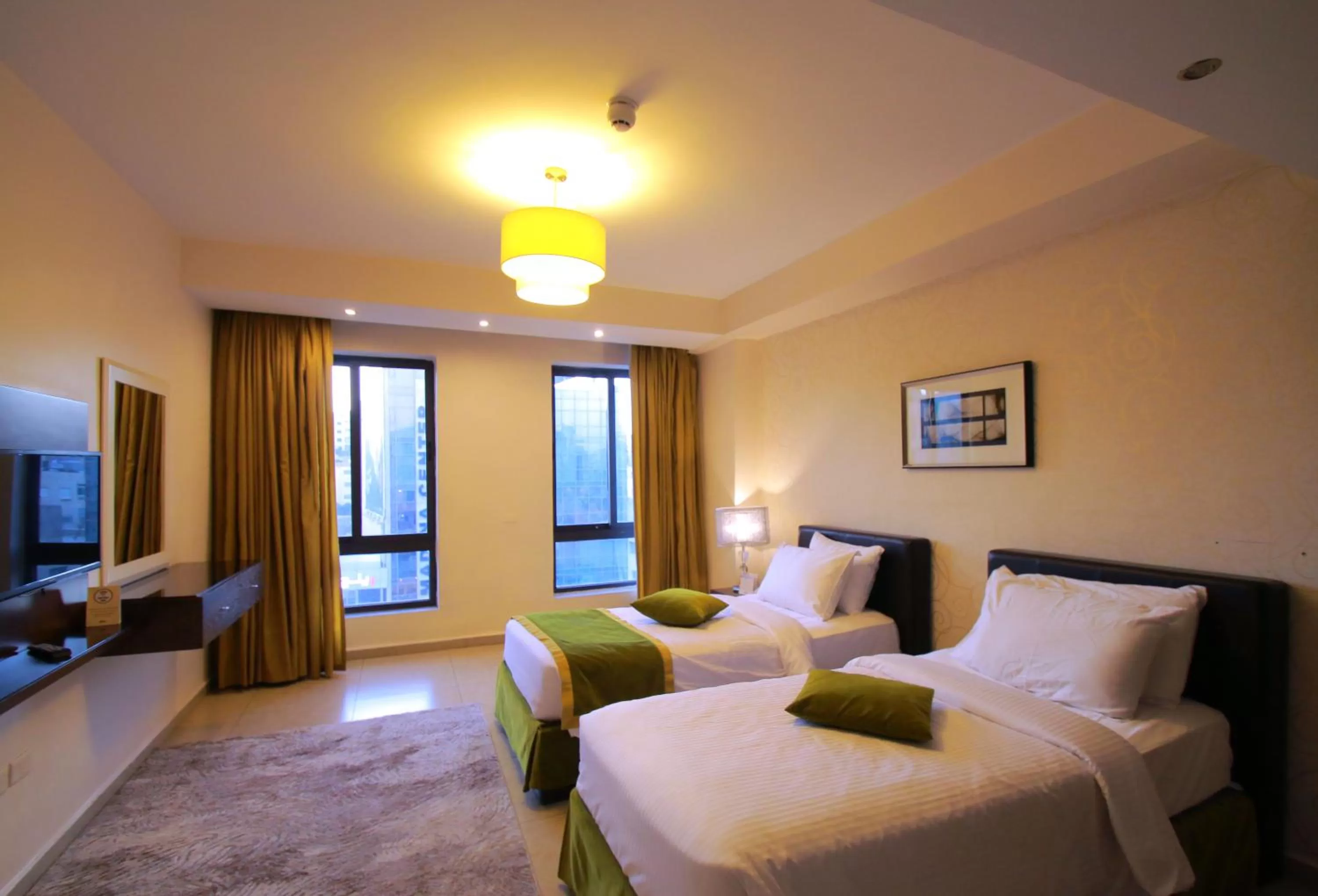 Bed in City Rose Hotel Suites