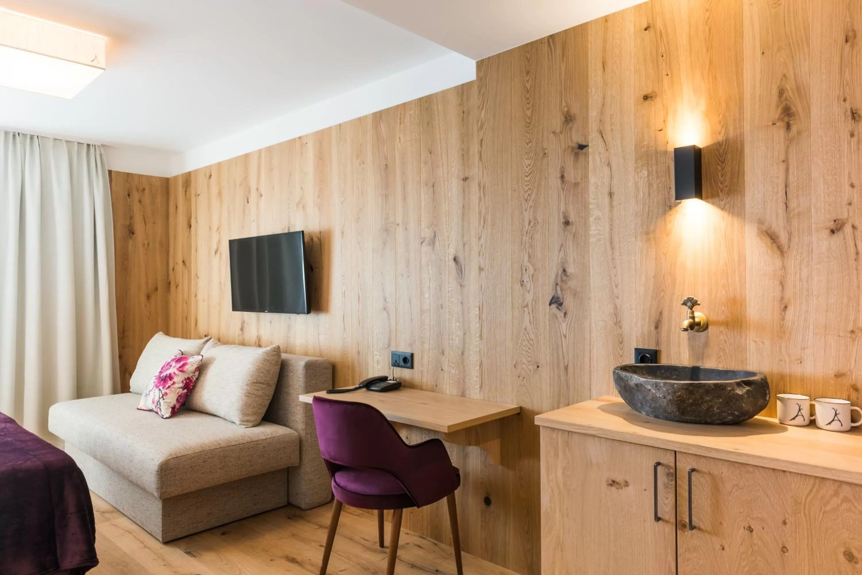 Photo of the whole room in Boutiquehotel die Alpbacherin 4 Sterne Superior