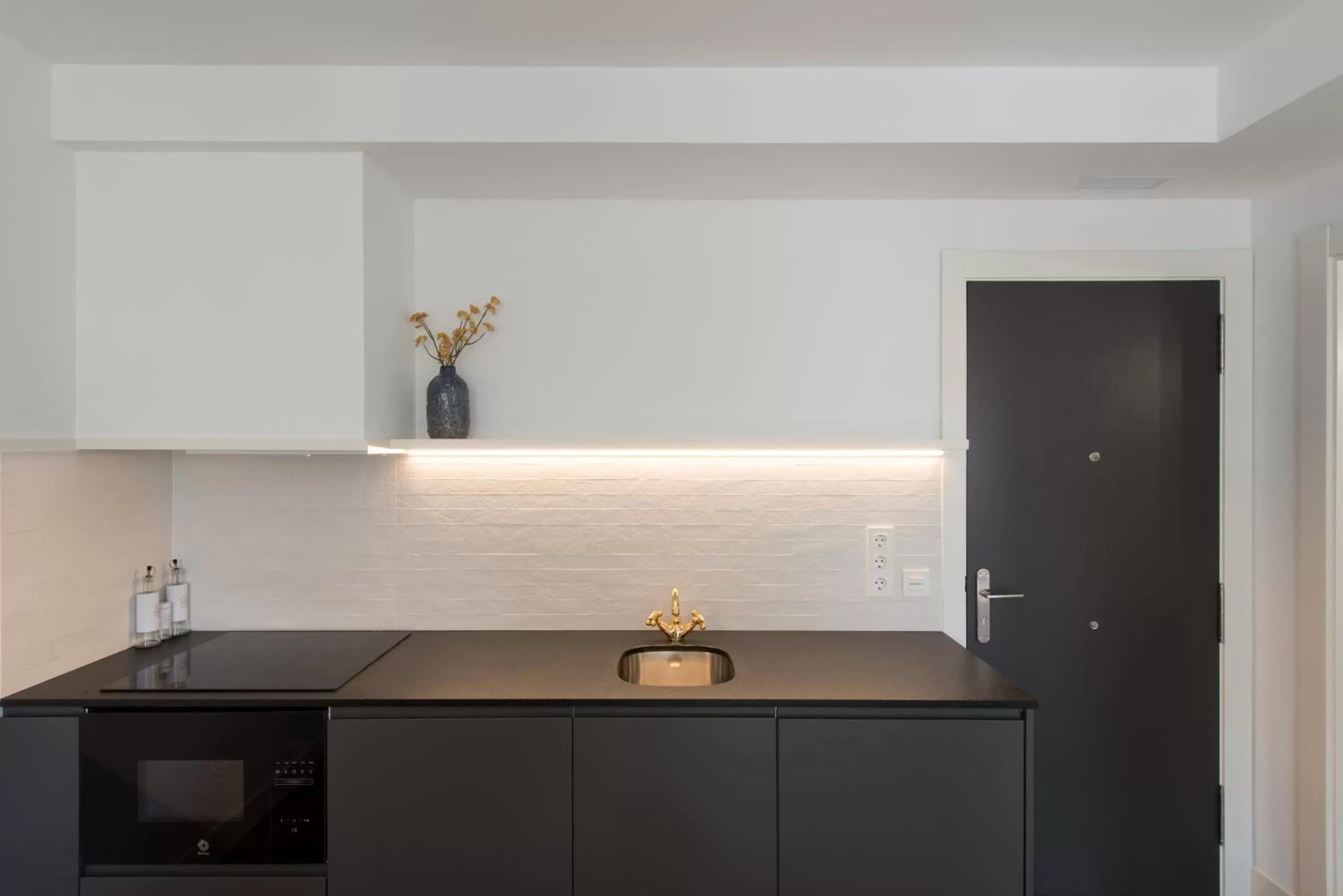 Kitchen or kitchenette in Santa Catalina Suites Gijón