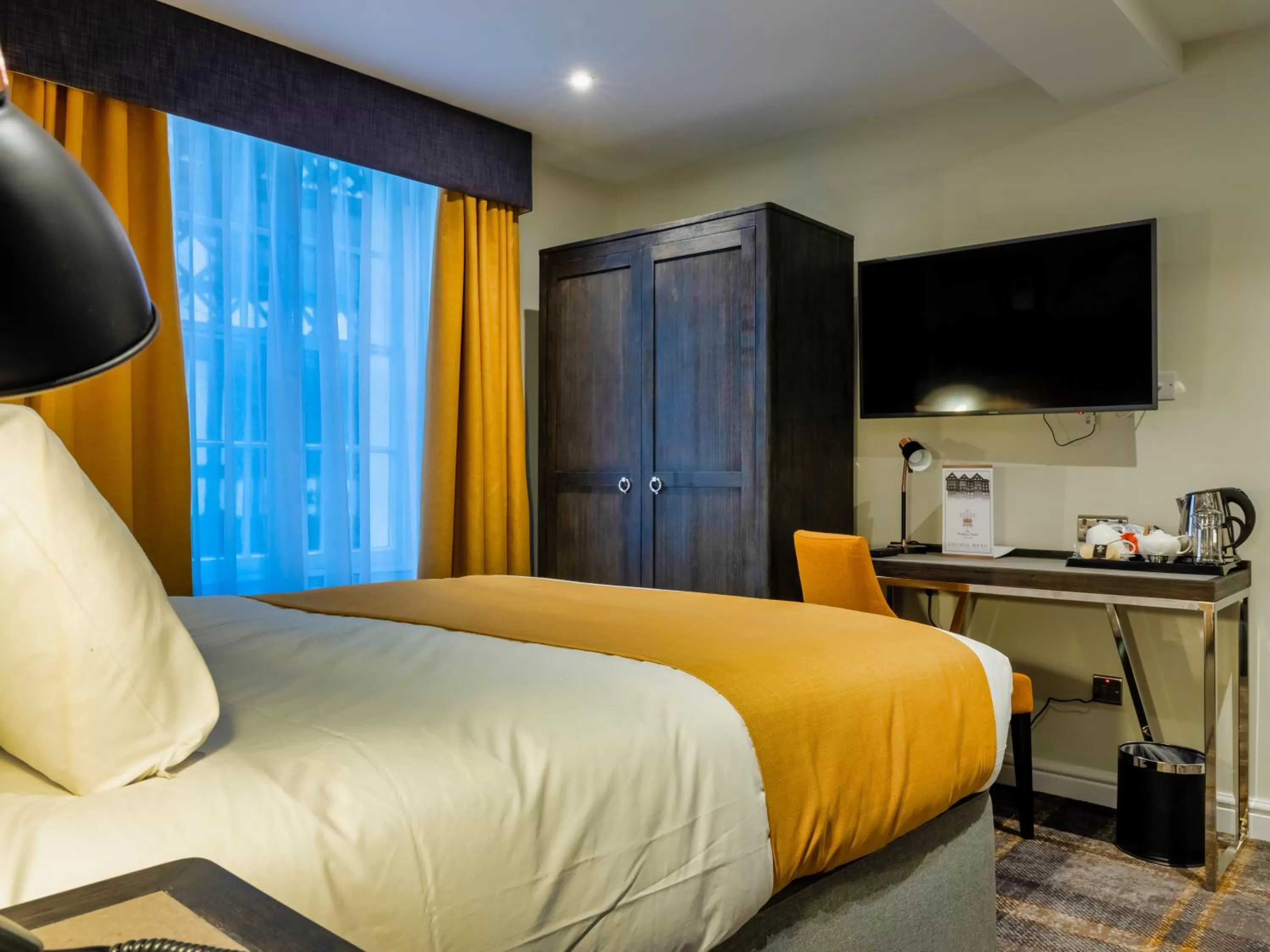 Bed in The Feathers Hotel