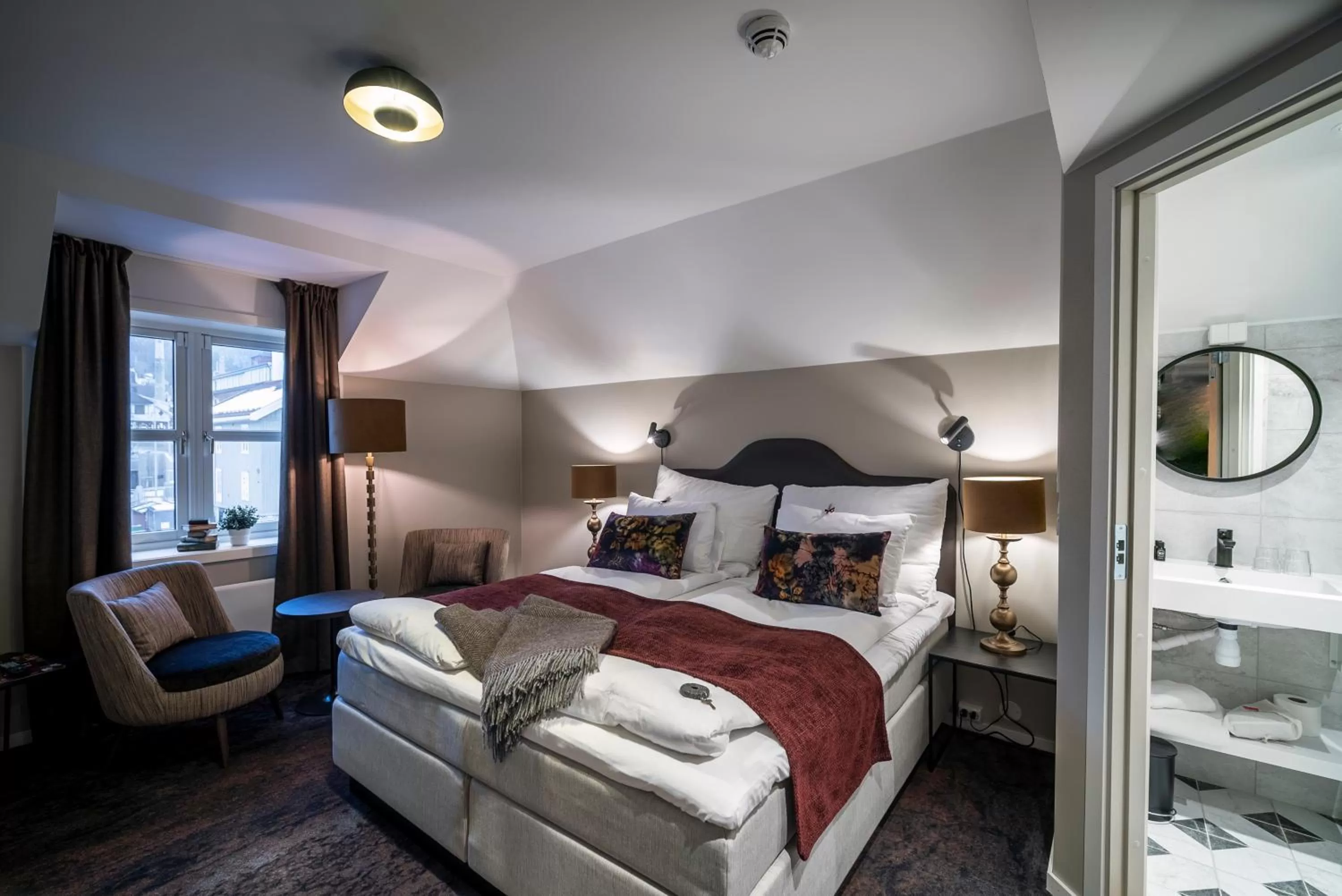 Photo of the whole room, Bed in Aksjemøllen - by Classic Norway Hotels