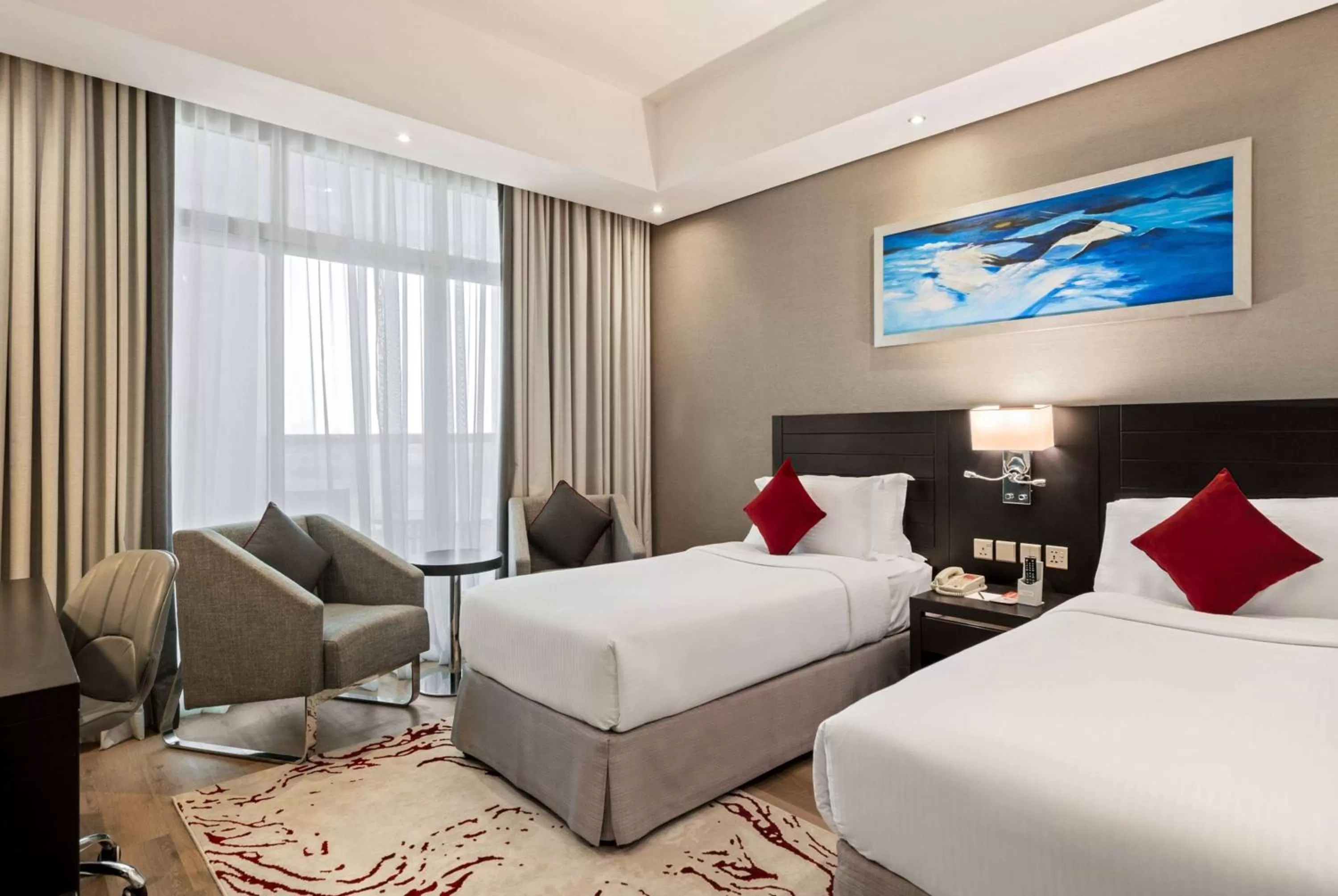 Photo of the whole room, Bed in Ramada by Wyndham Dubai Barsha Heights