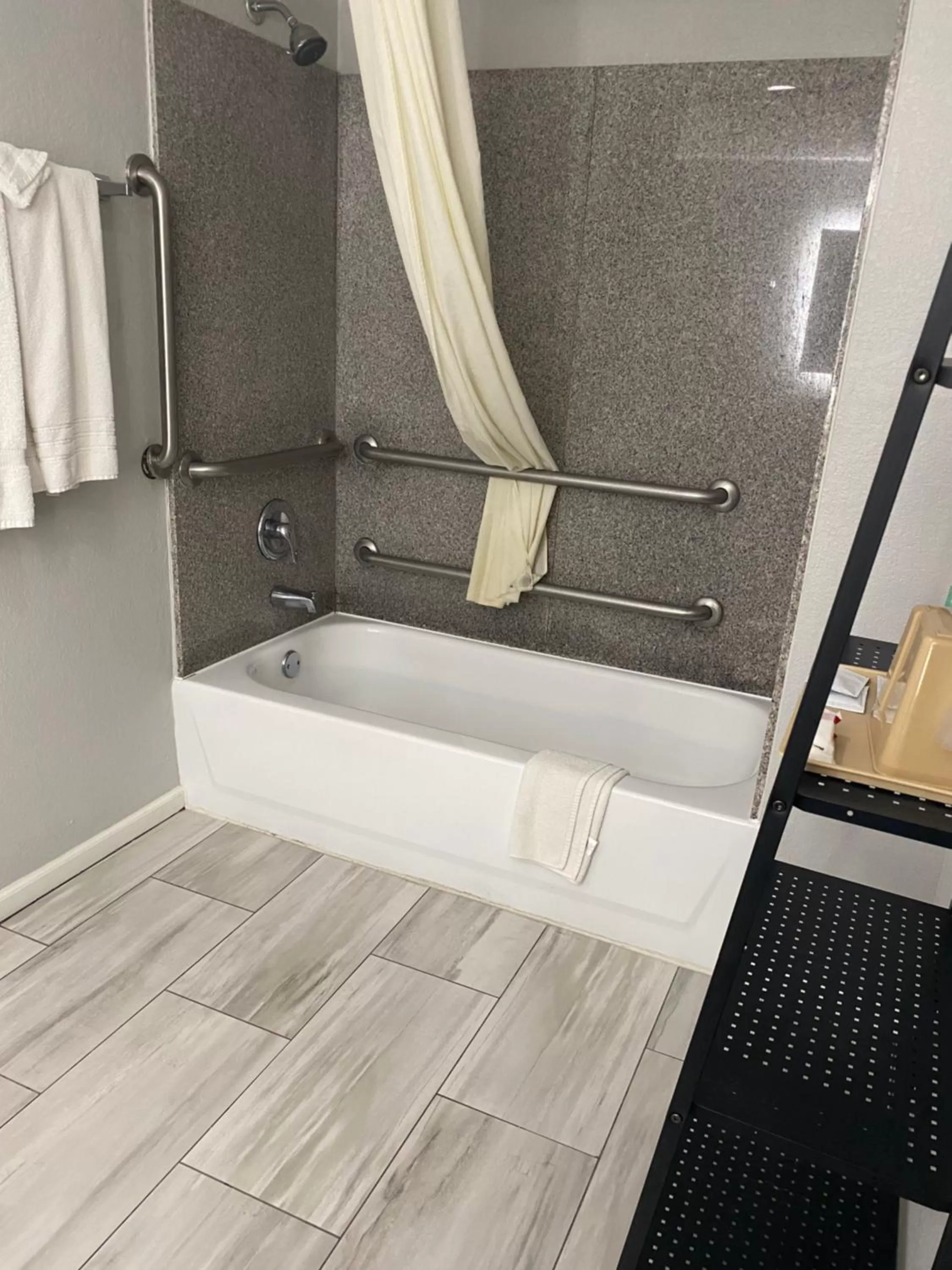 Bathroom in SureStay Hotel by Best Western Spring North Houston