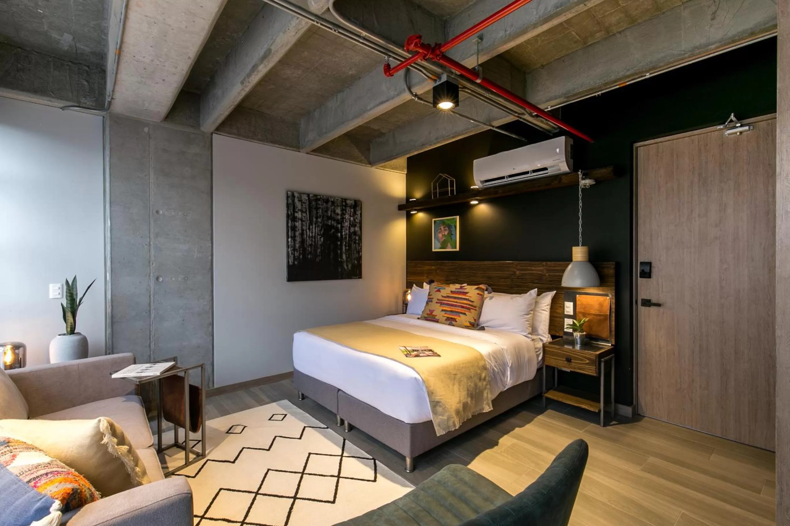 Bed in Factory Lofts Hotel