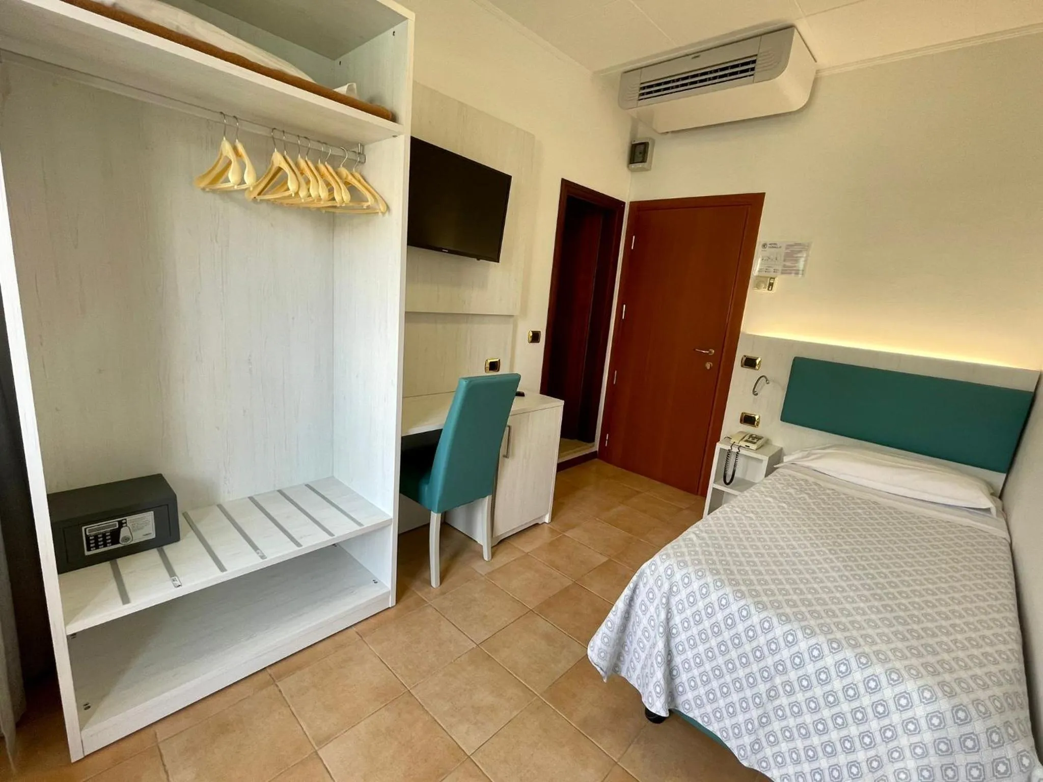 Bed in Hotel Corallo