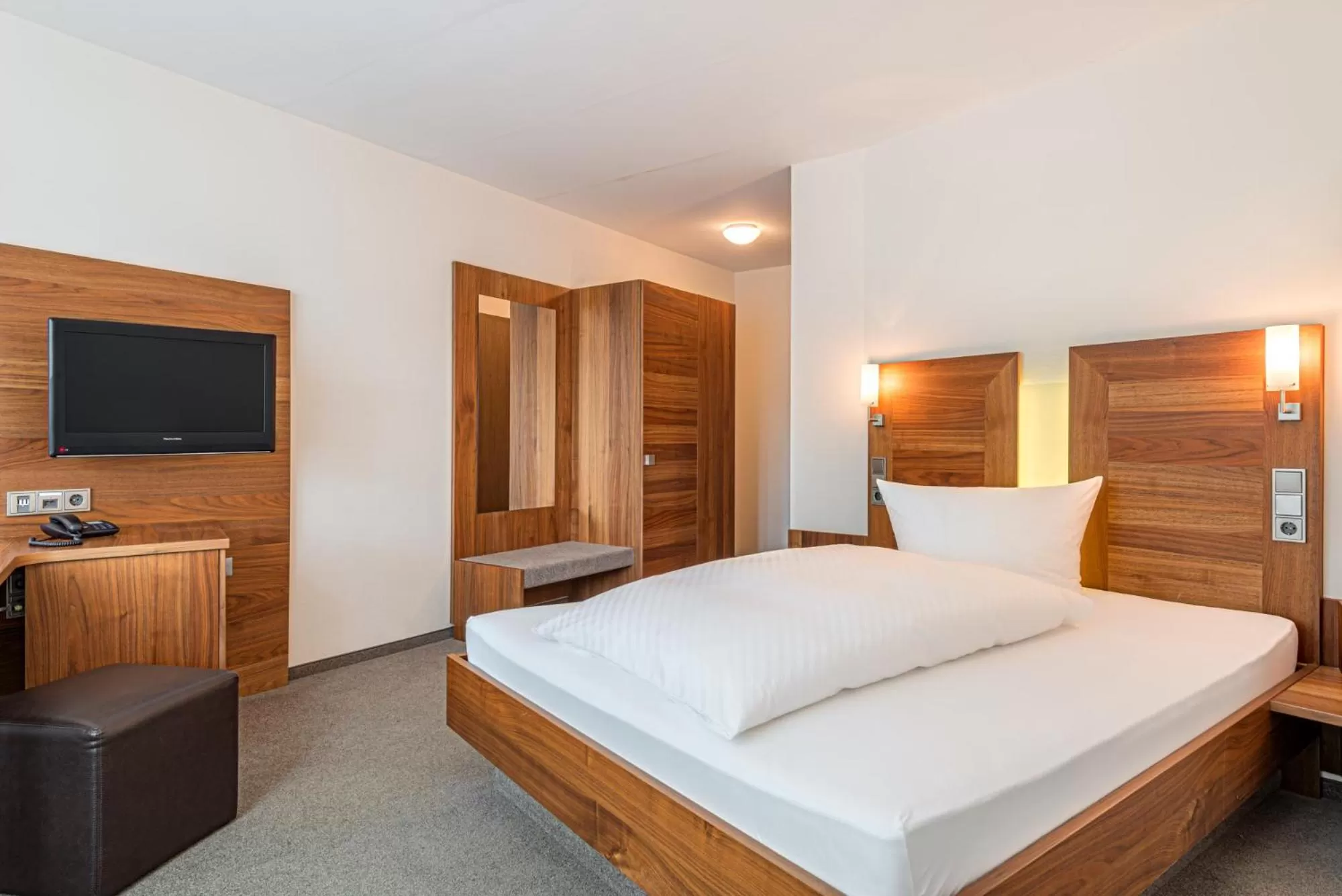 Photo of the whole room, Bed in Hotel Pfeffermühle