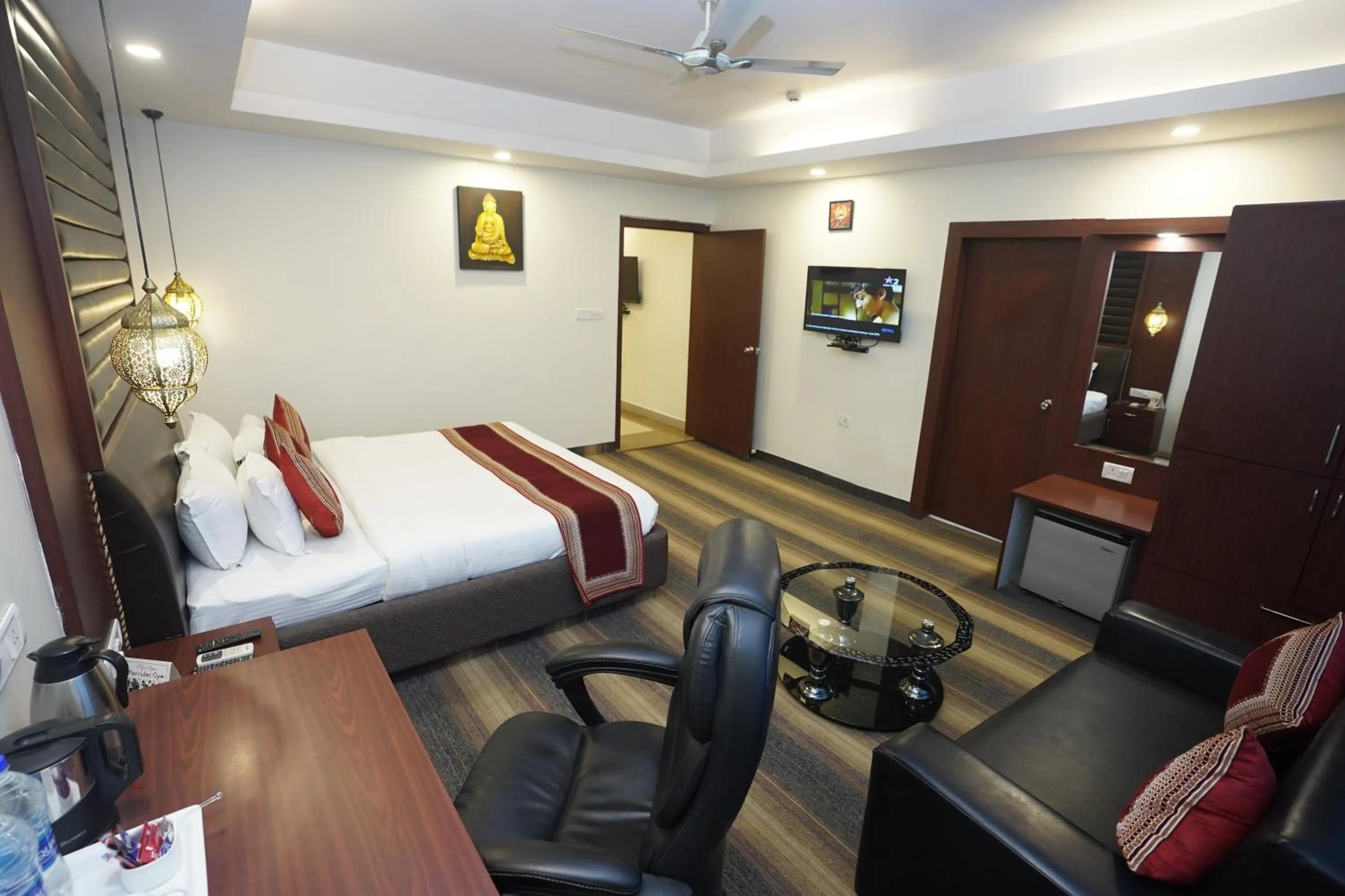 Photo of the whole room, Bed in HOTEL AVN GRAND