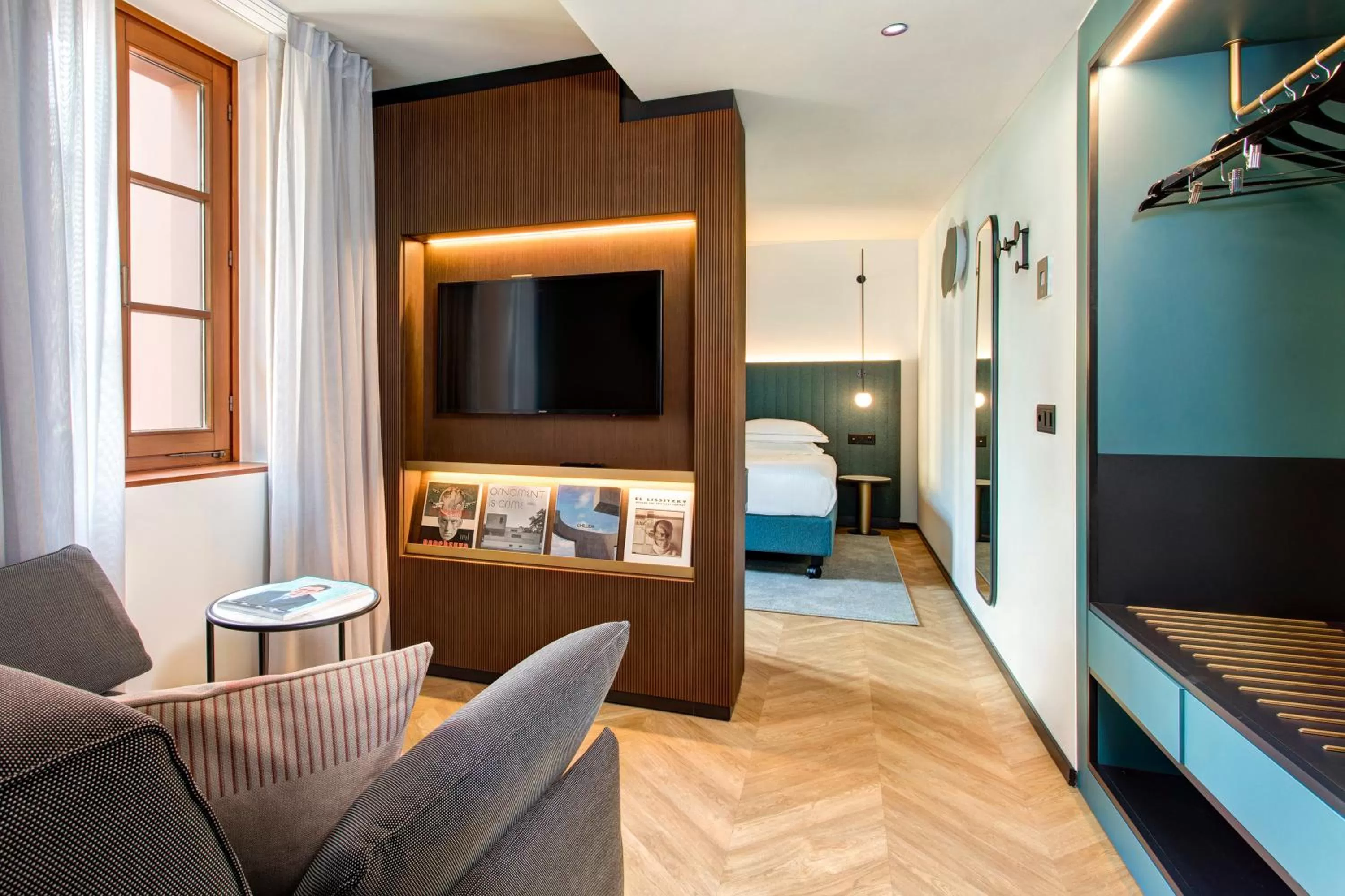 Communal lounge/ TV room in LUGANODANTE Boutique & Lifestyle Hotel