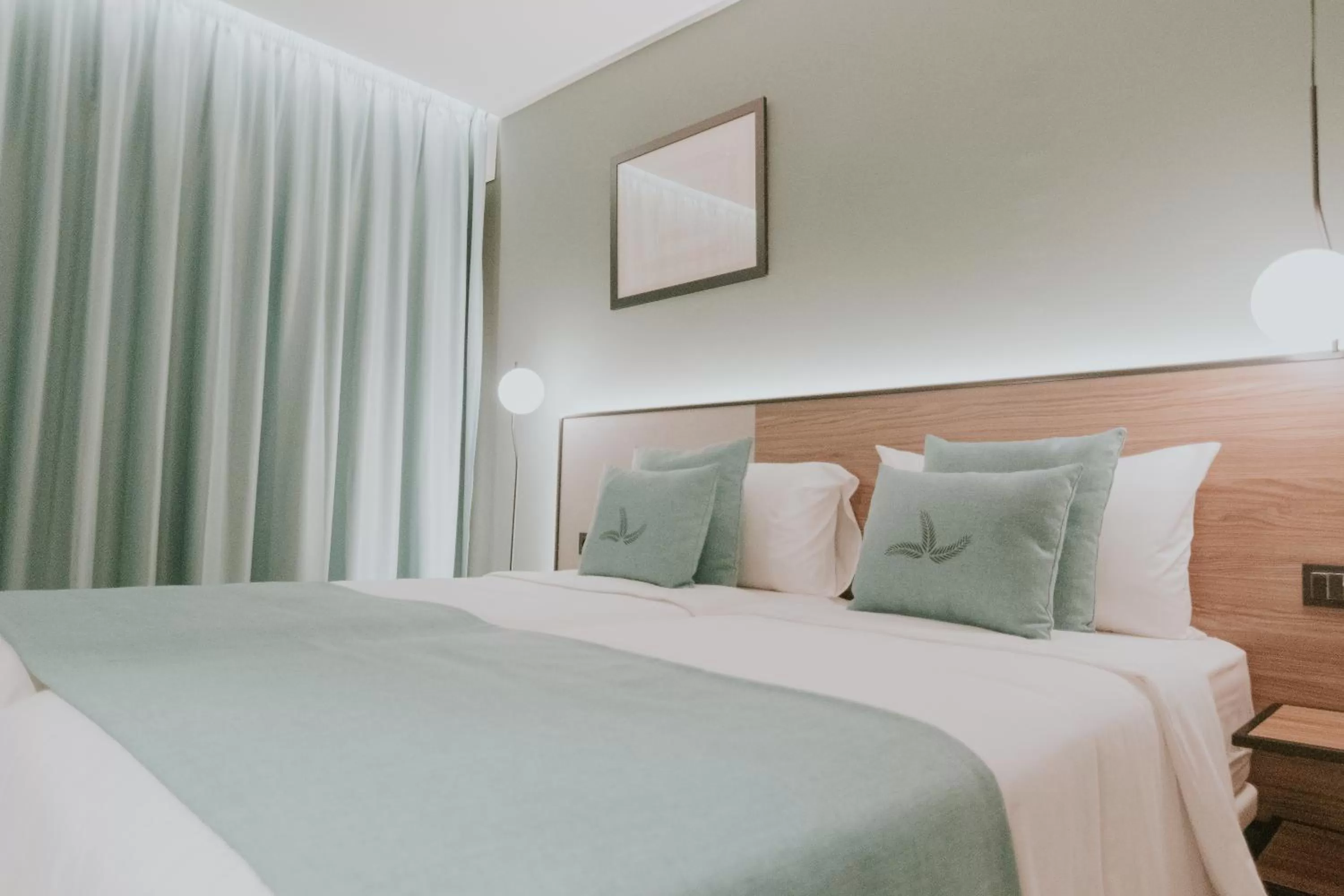 Bed in Catalina Plaza Hotel Sostenible