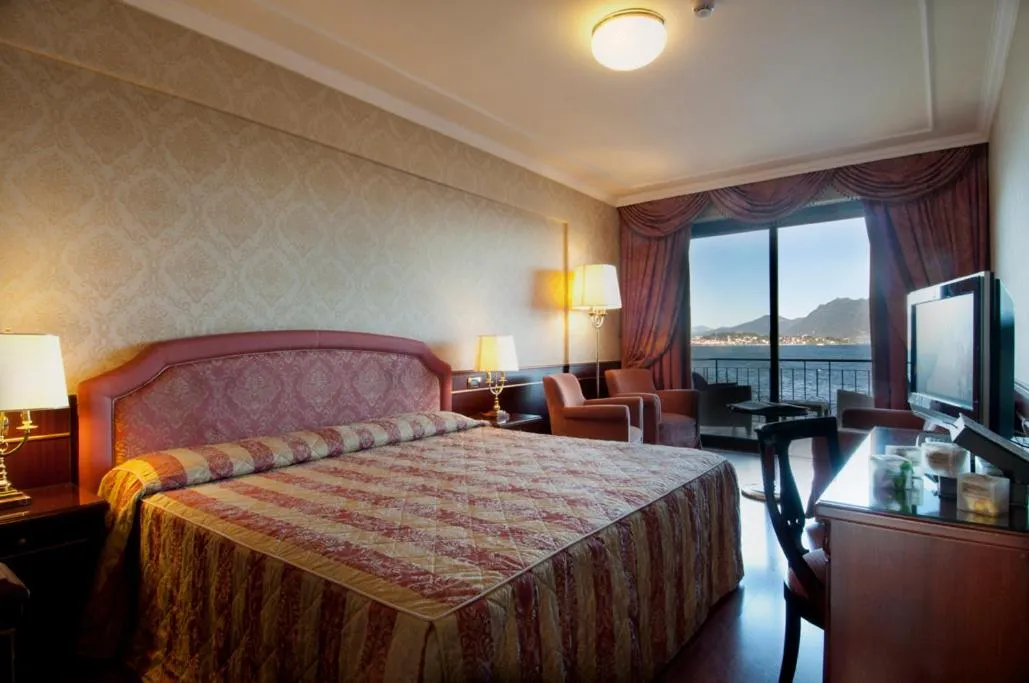 Photo of the whole room, Bed in Grand Hotel Dino