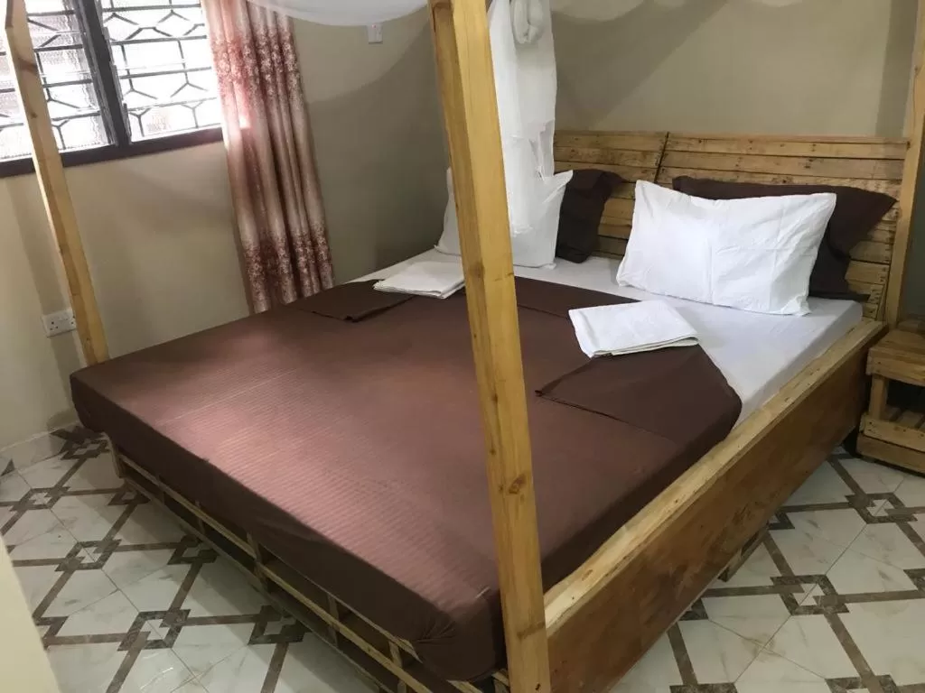 Photo of the whole room, Bed in L&J Modern Backpackers Kinondoni