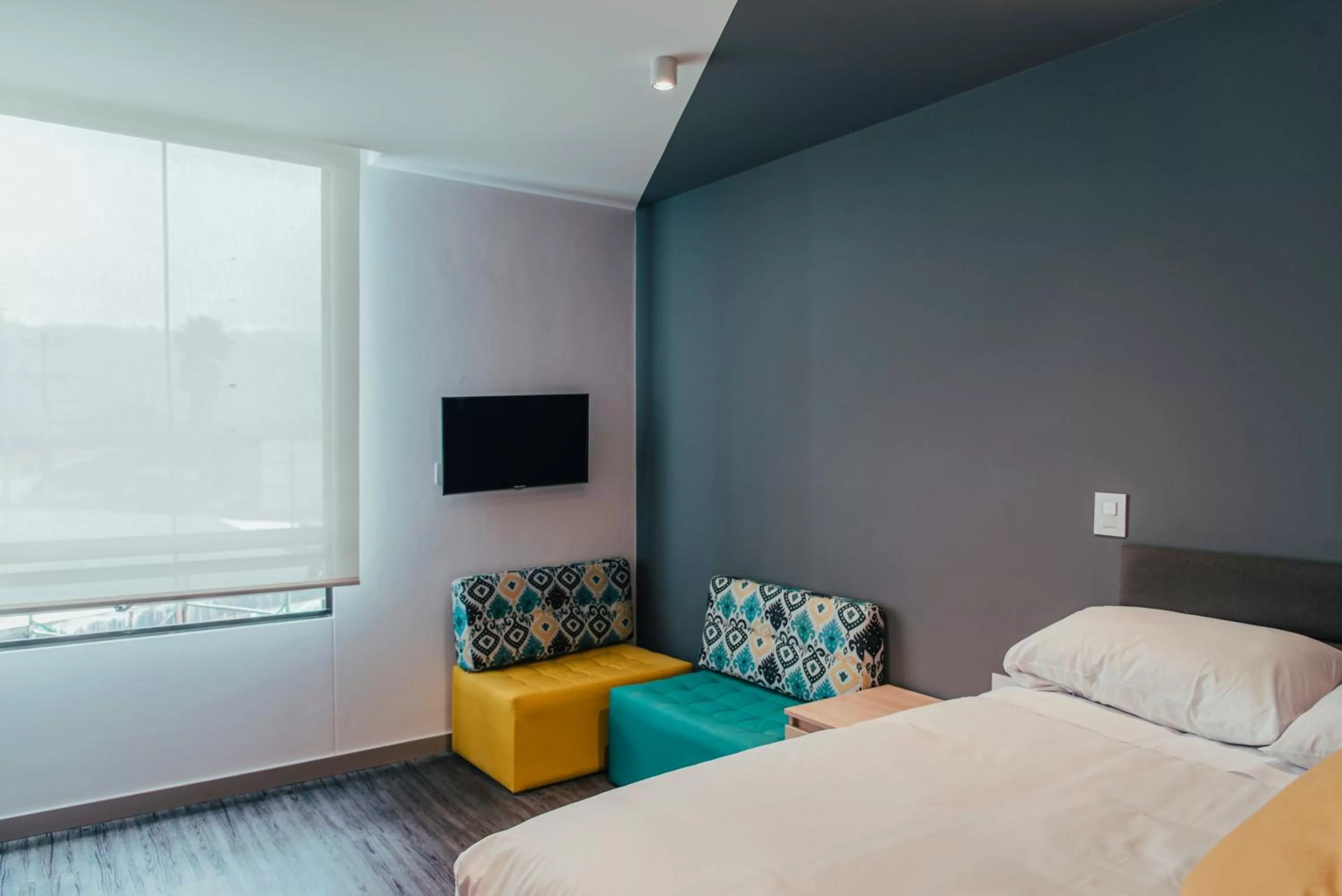 TV and multimedia, Bed in UMA Suites Chia