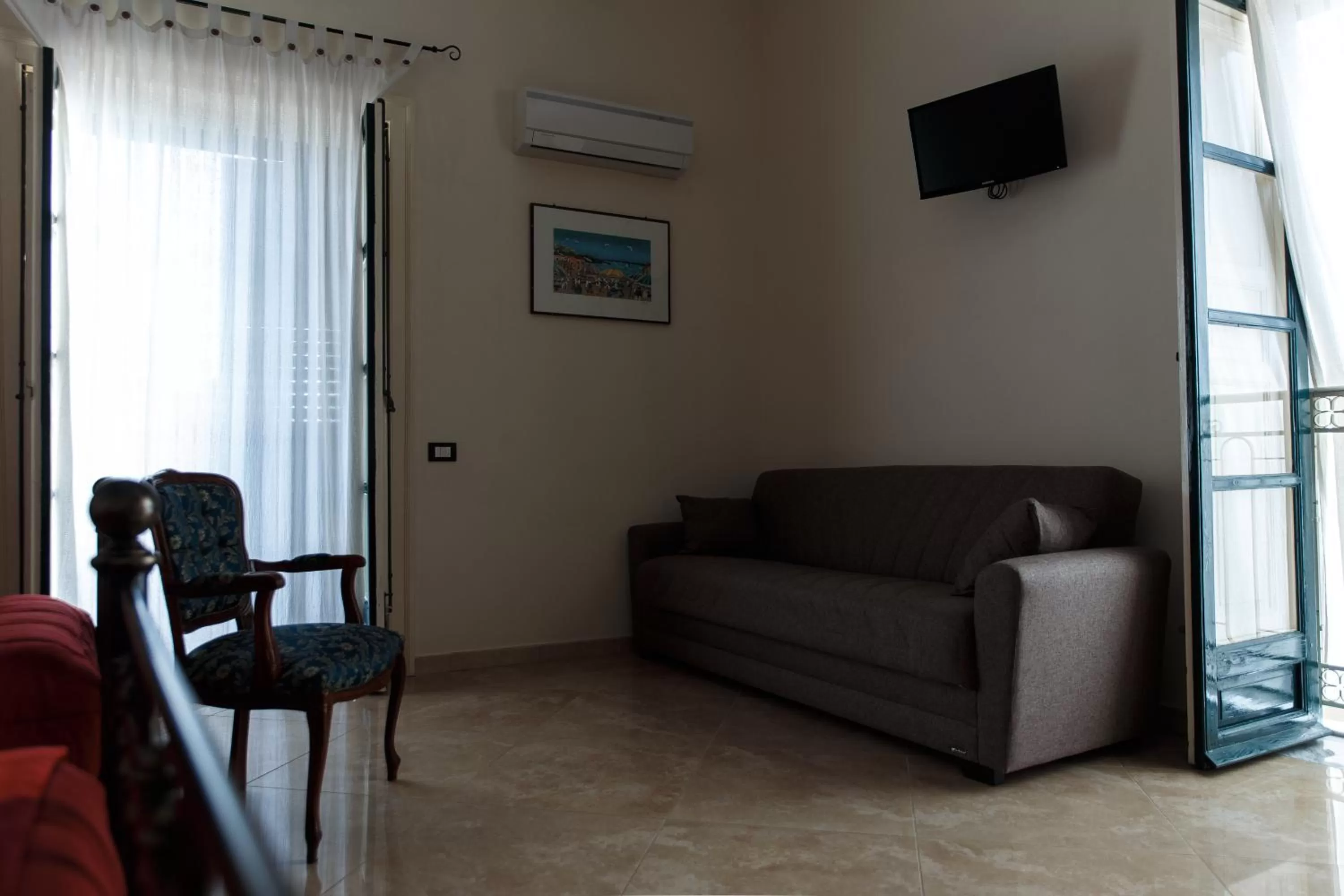 Bedroom, Seating Area in B&B Batarà - "La Terrazza del Centro"