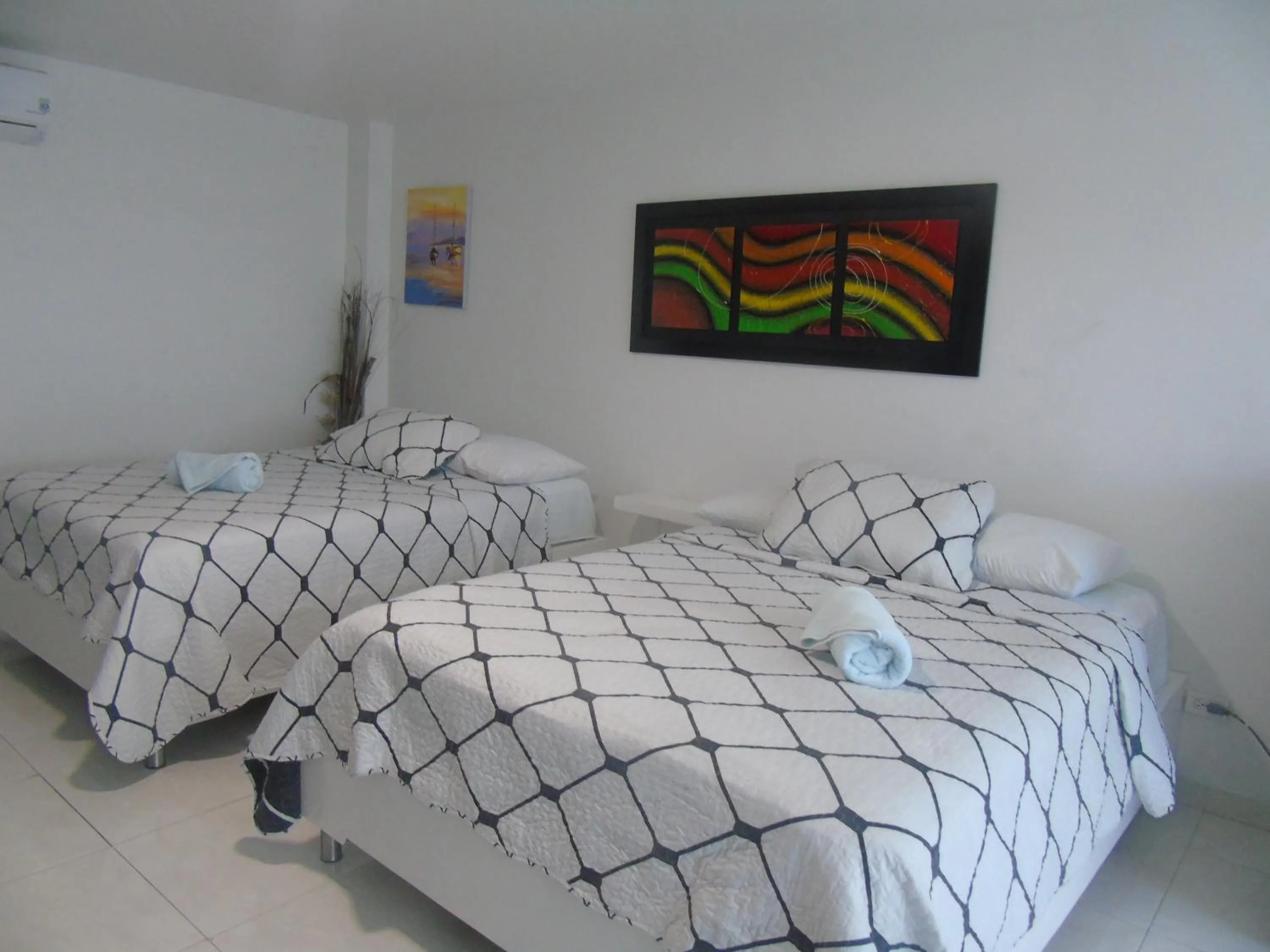 Bed in Blue Emerald Inn