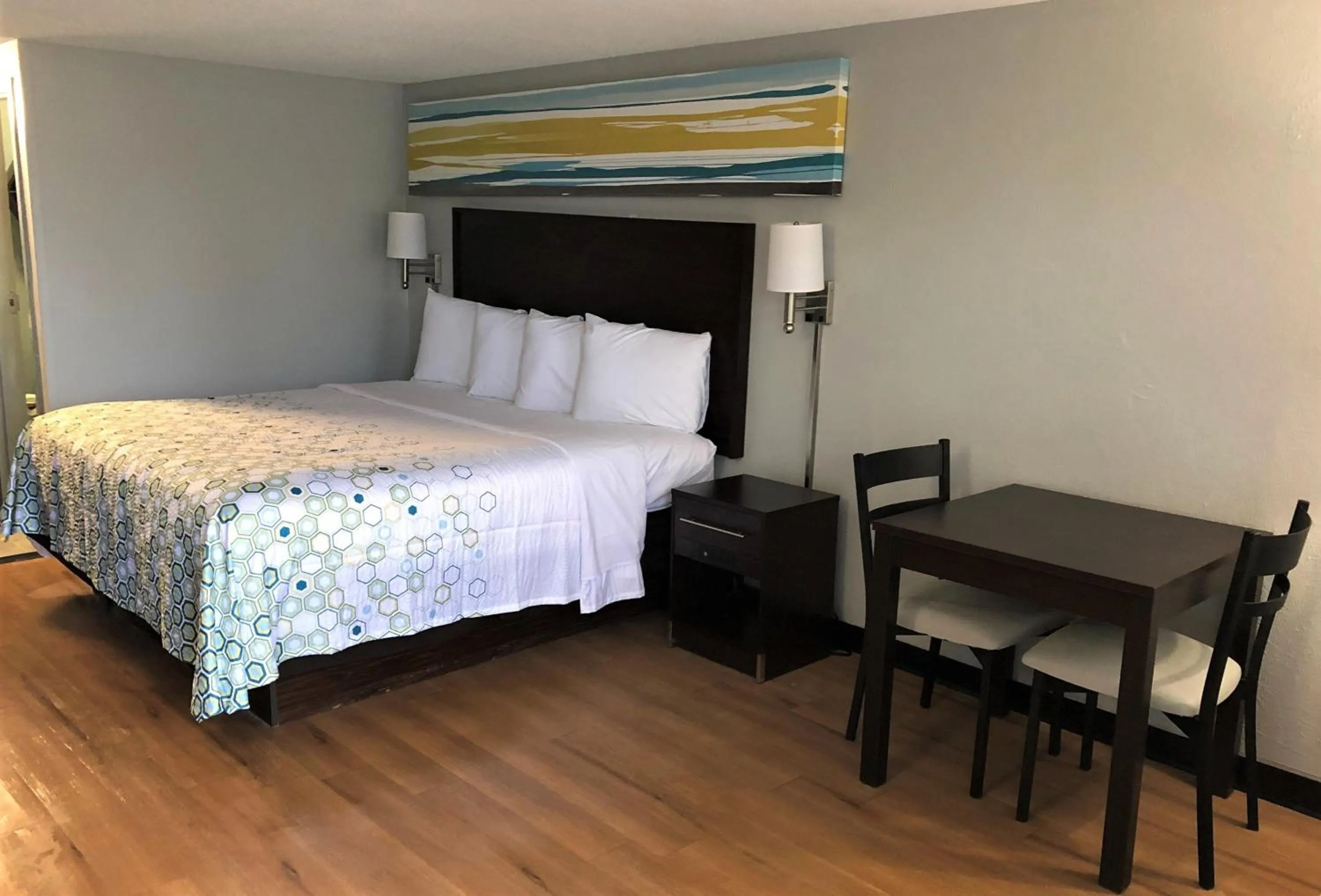 Bedroom, Bed in HomeTowne Studios by Red Roof Augusta