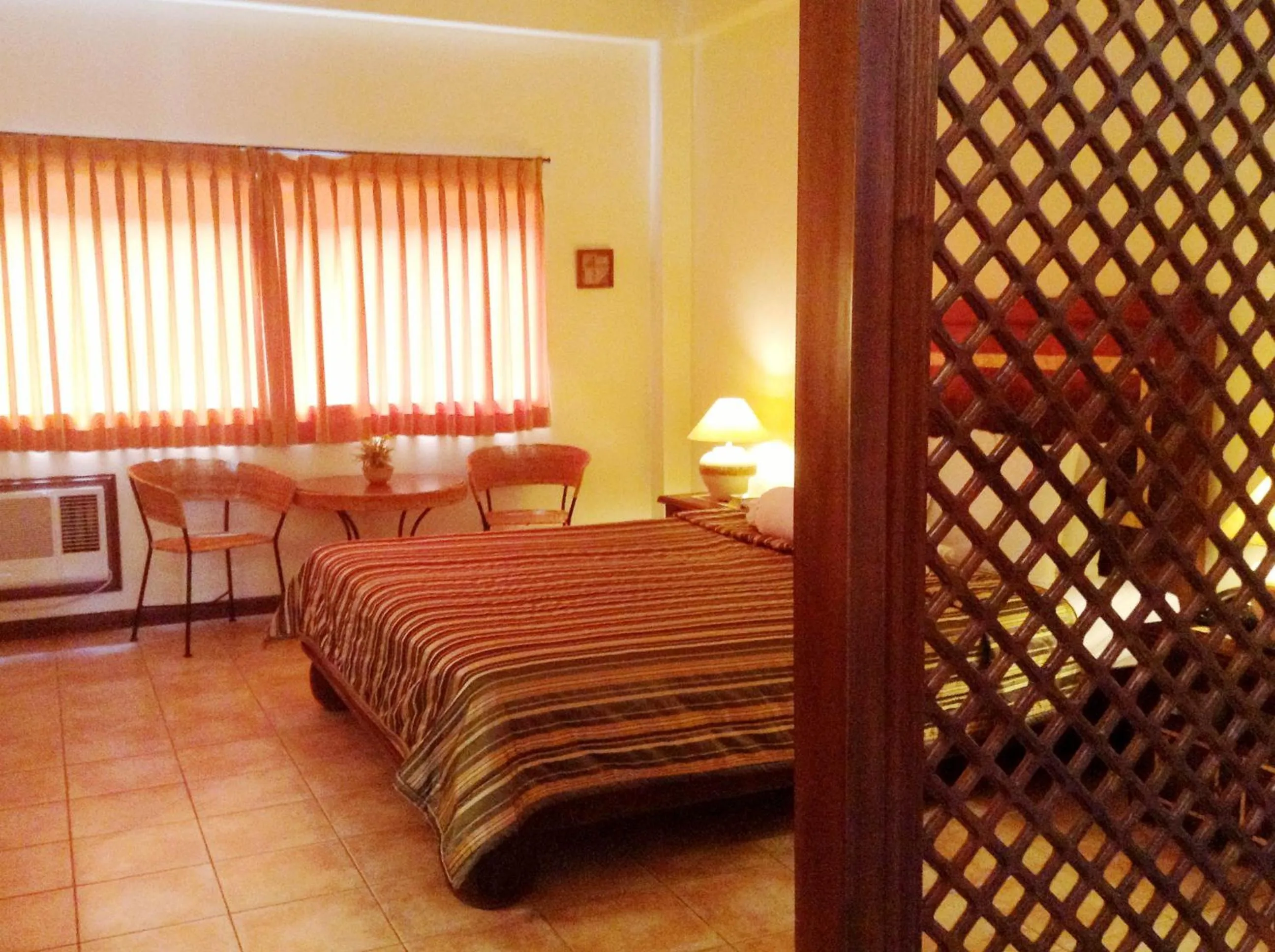 Bed in Citystate Asturias Hotel Palawan