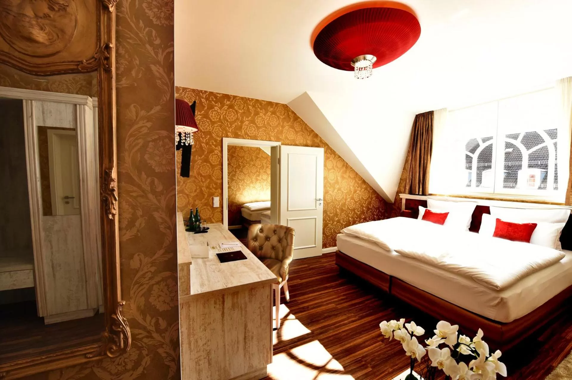 Photo of the whole room, Bed in MOMENTS Boutique Hotel