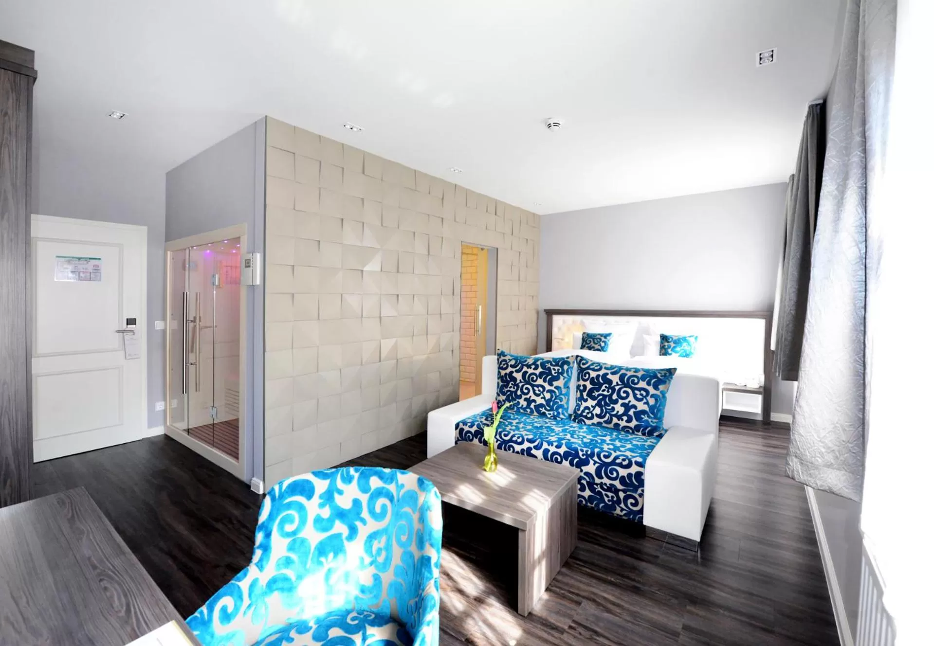 Bed in MOMENTS Boutique Hotel