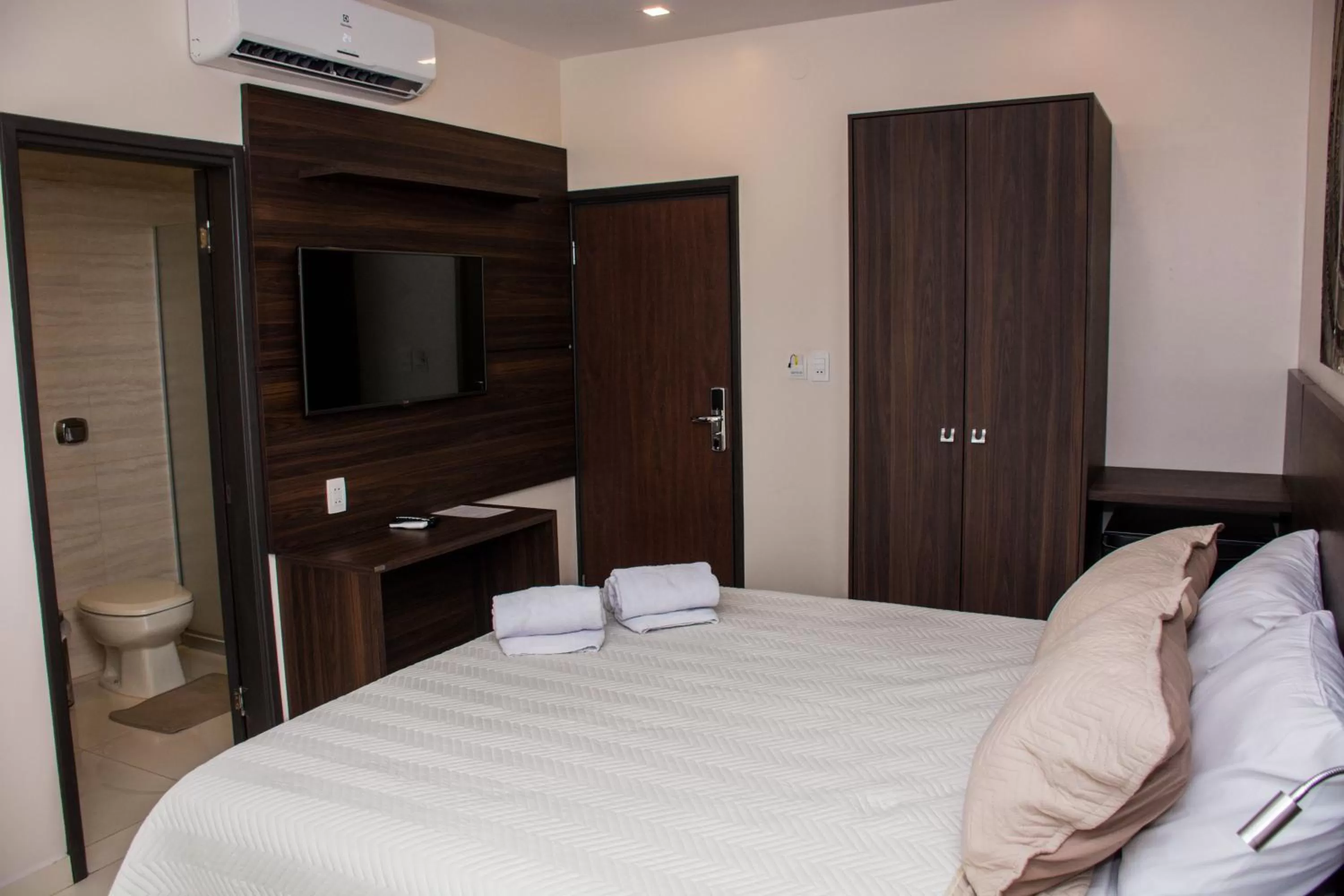 Bed in SERPYL Plaza Hotel